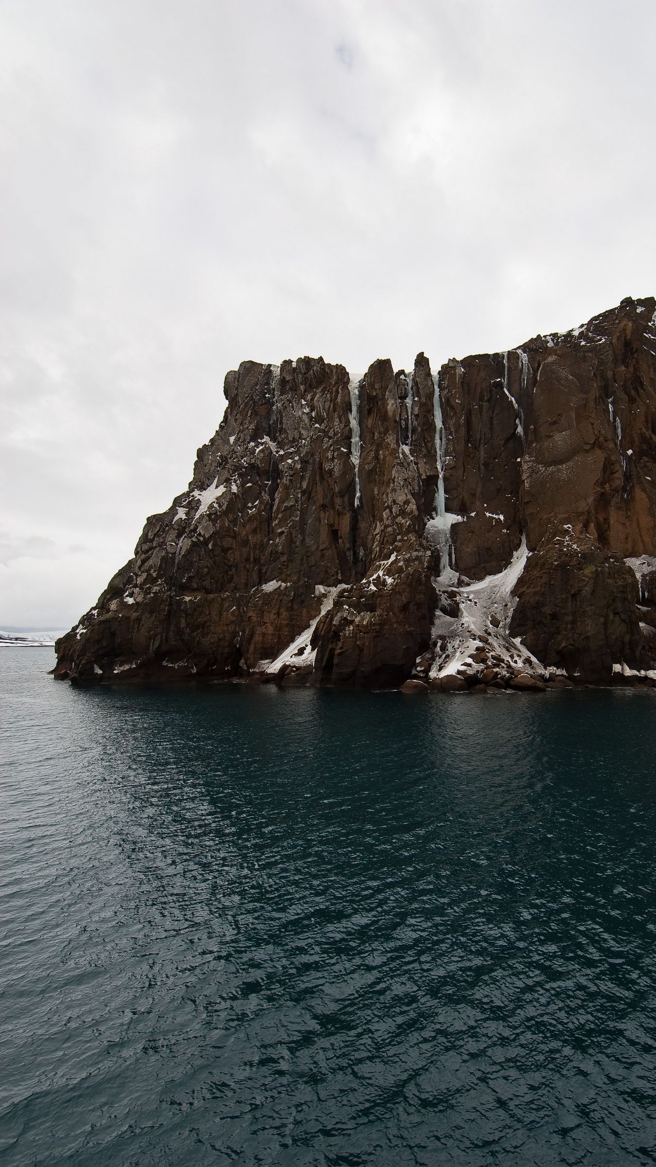 Download wallpaper 1350x2400 cliff, rock, sea, water, coast iphone