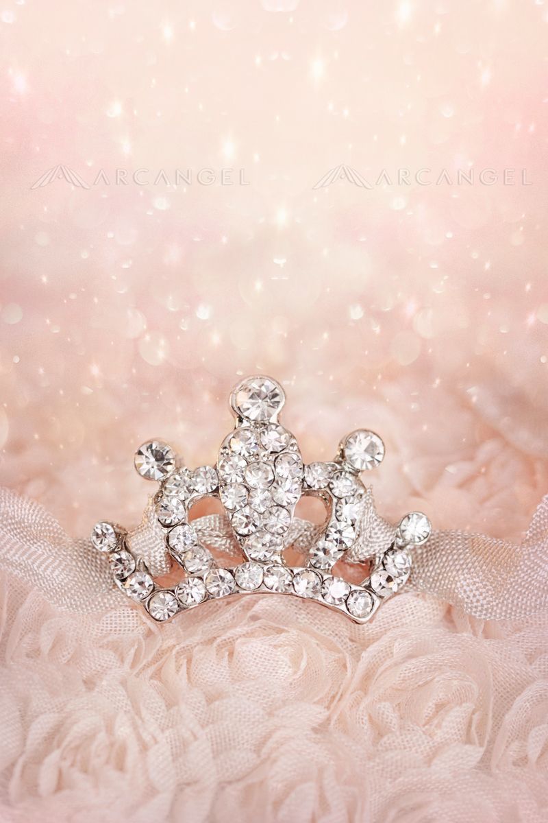 Small diamond crown on pastel background. Pastel background