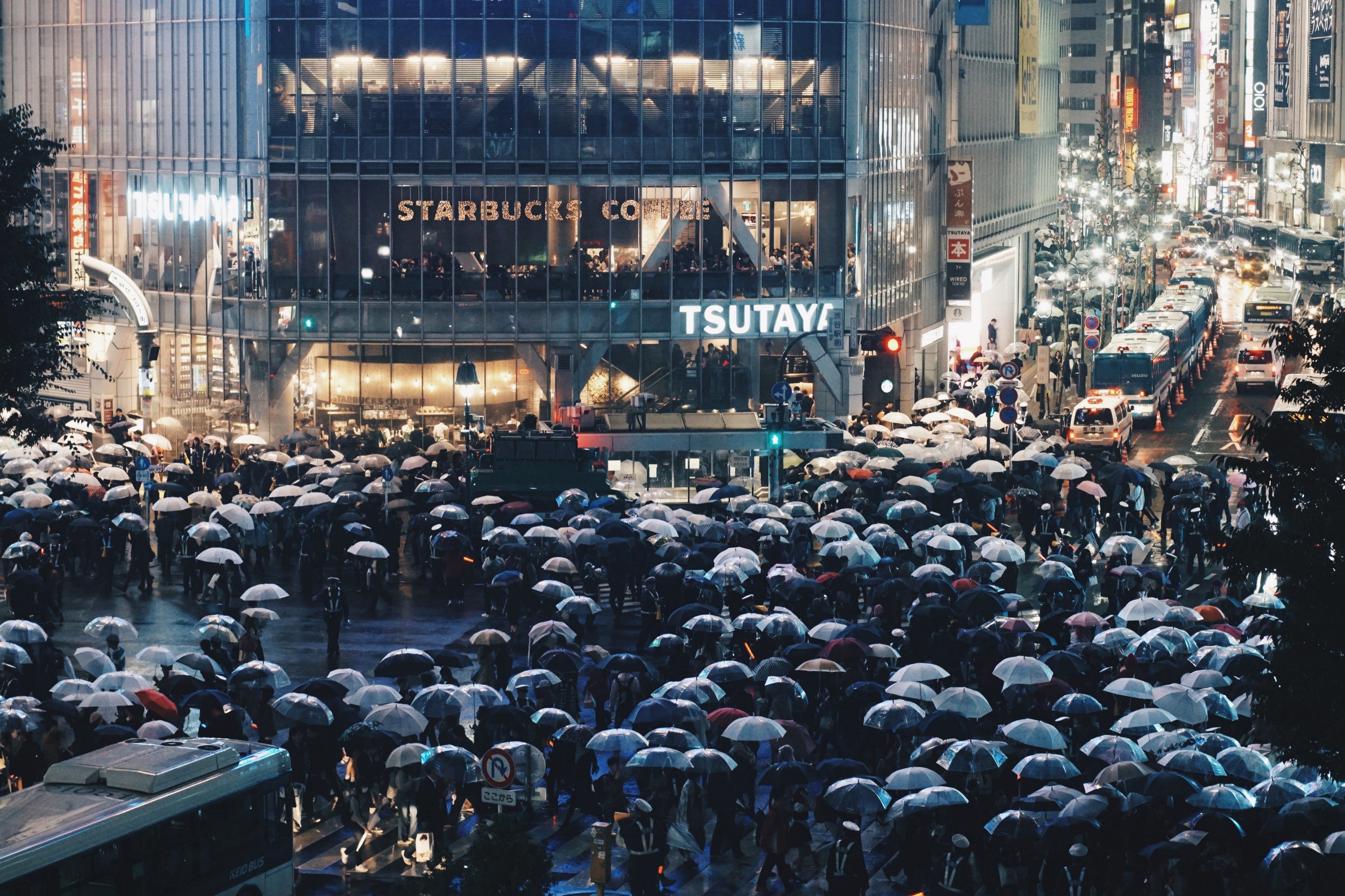 a rainy shibuya crossing at night 4k wallpaper and background