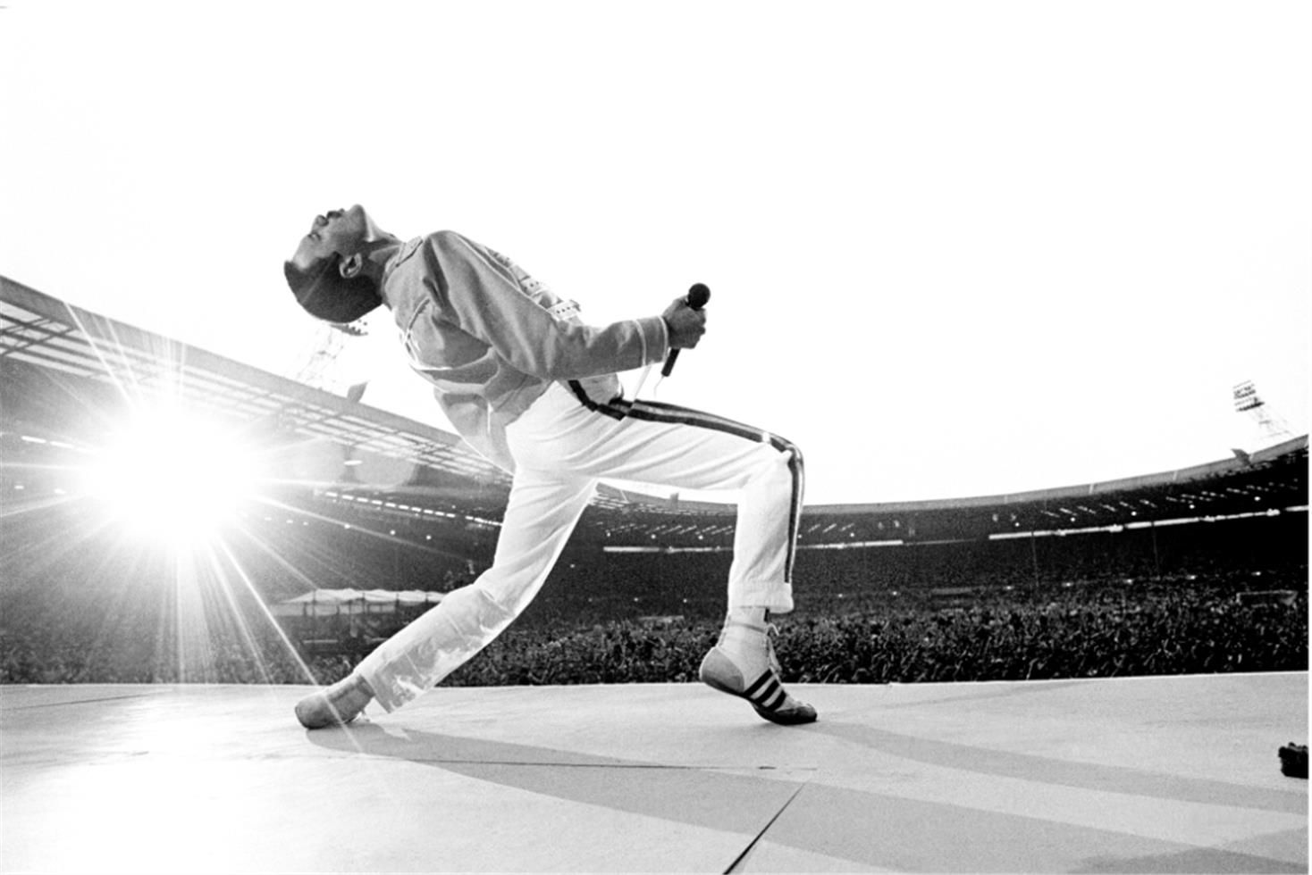 Freddie Mercury with Queen at Wembley Stadium in 1986