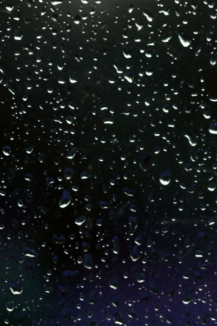 Download Rain Drops On Black Glass Wallpaper