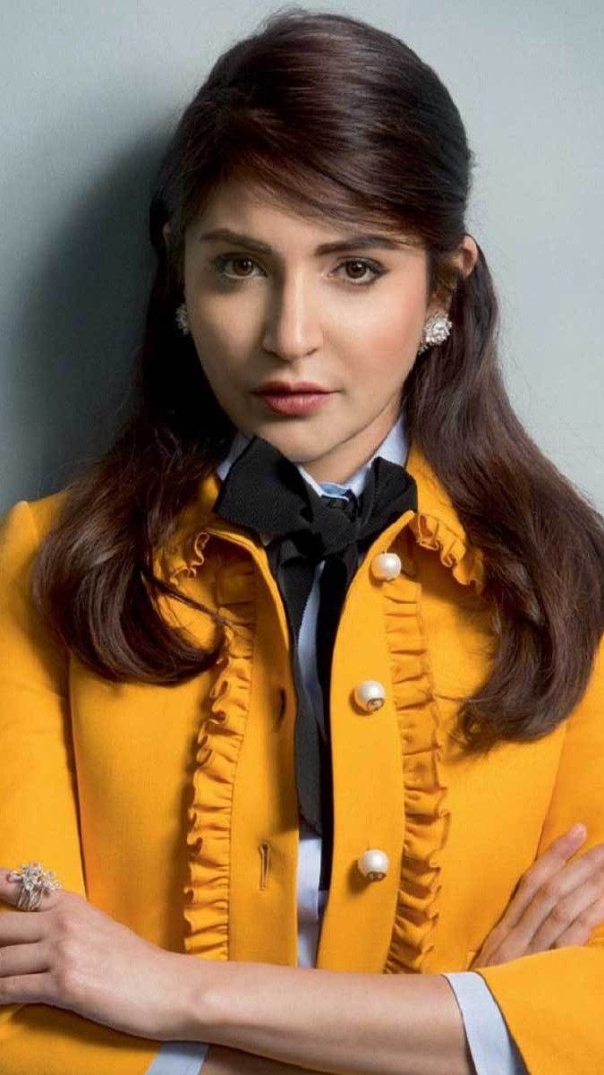 Anushka Sharma dashing in yellow jacket glamour mobile wallpaper