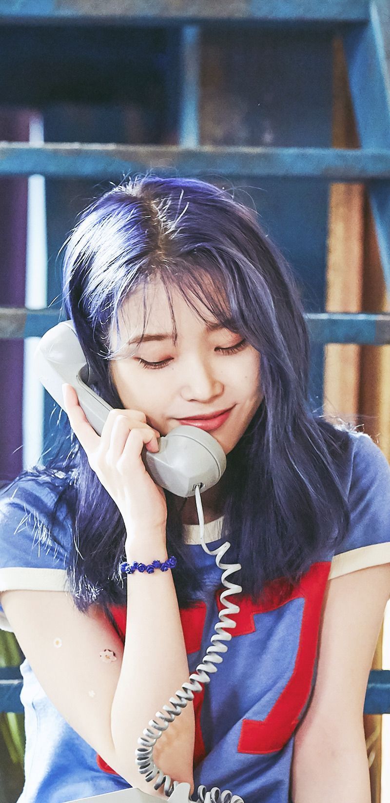 IU Blueming (Bloomington) behind the background of the phone lock