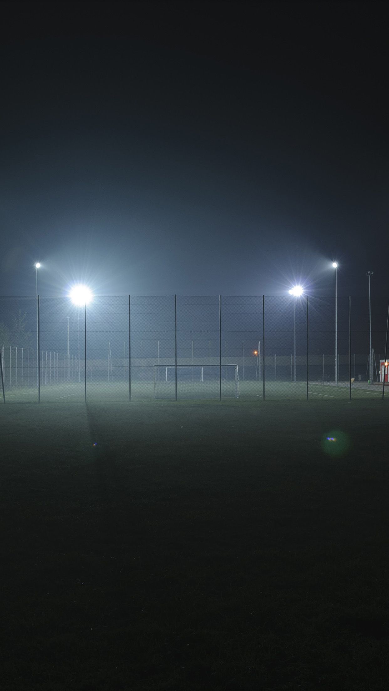 Soccer Field City Night Light Dark Wallpaper