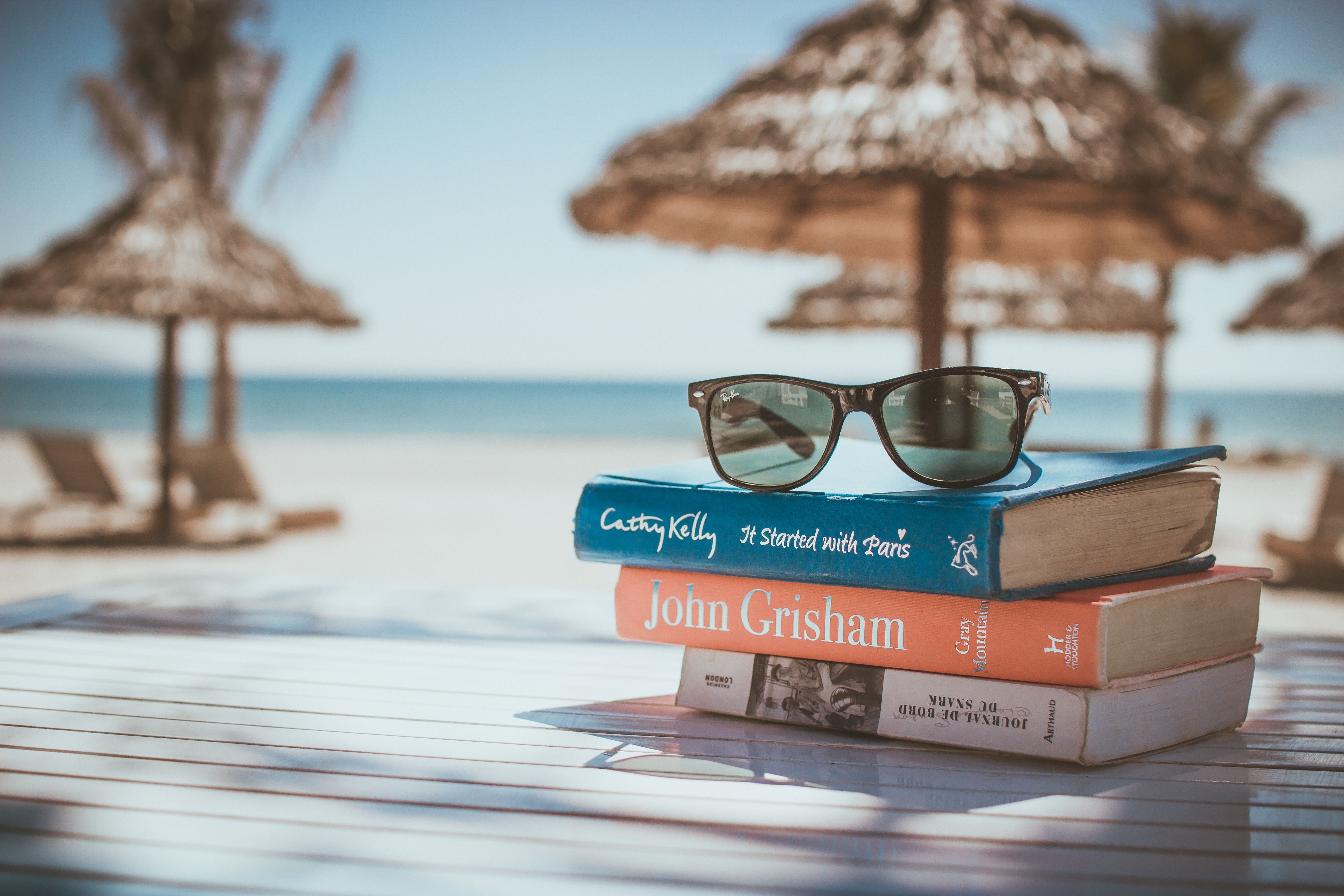 Download wallpaper 5184x3456 sunglasses, books, beach, sun HD