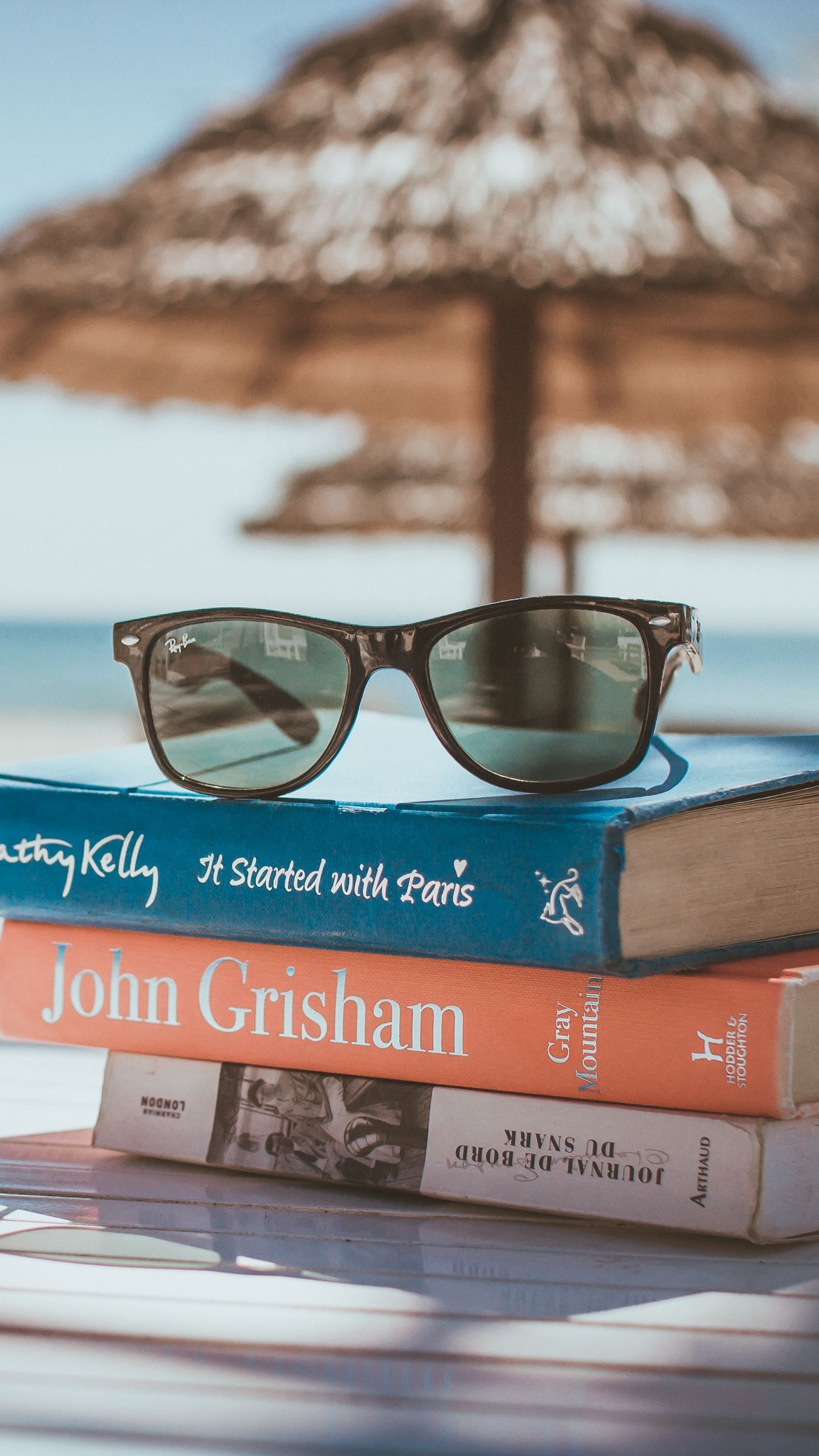 Download wallpaper 1350x2400 sunglasses, books, beach, sun iphone