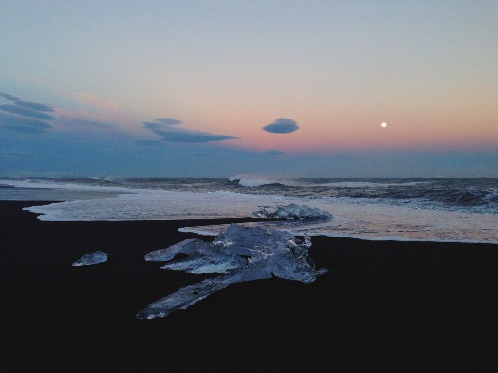 Waves, moon, icebergs, black sand. priceless. #iceland #sunset