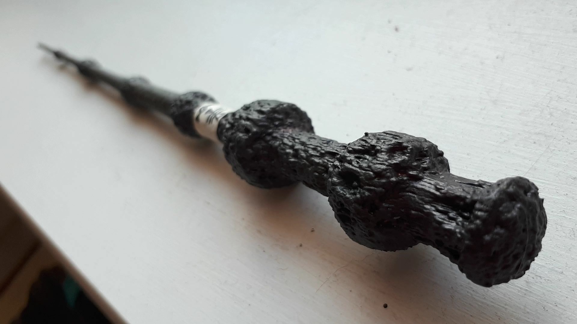 3D printed and painted the Elder Wand. It's too dark, but I'm