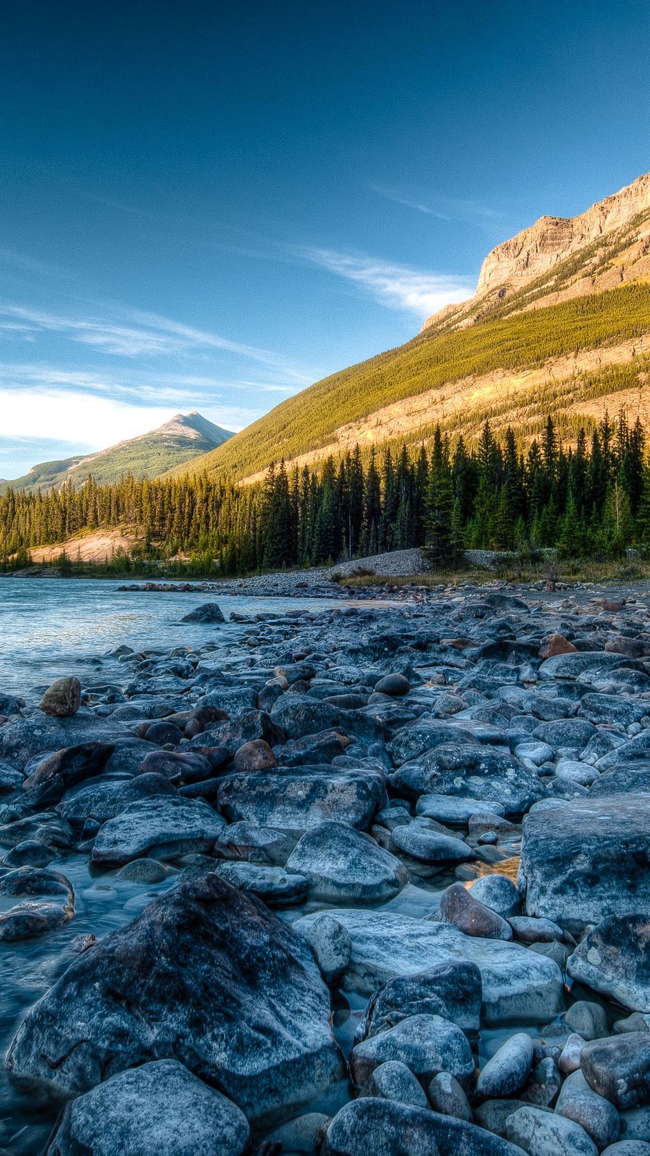 Download wallpaper 938x1668 rocky mountains, river, stones