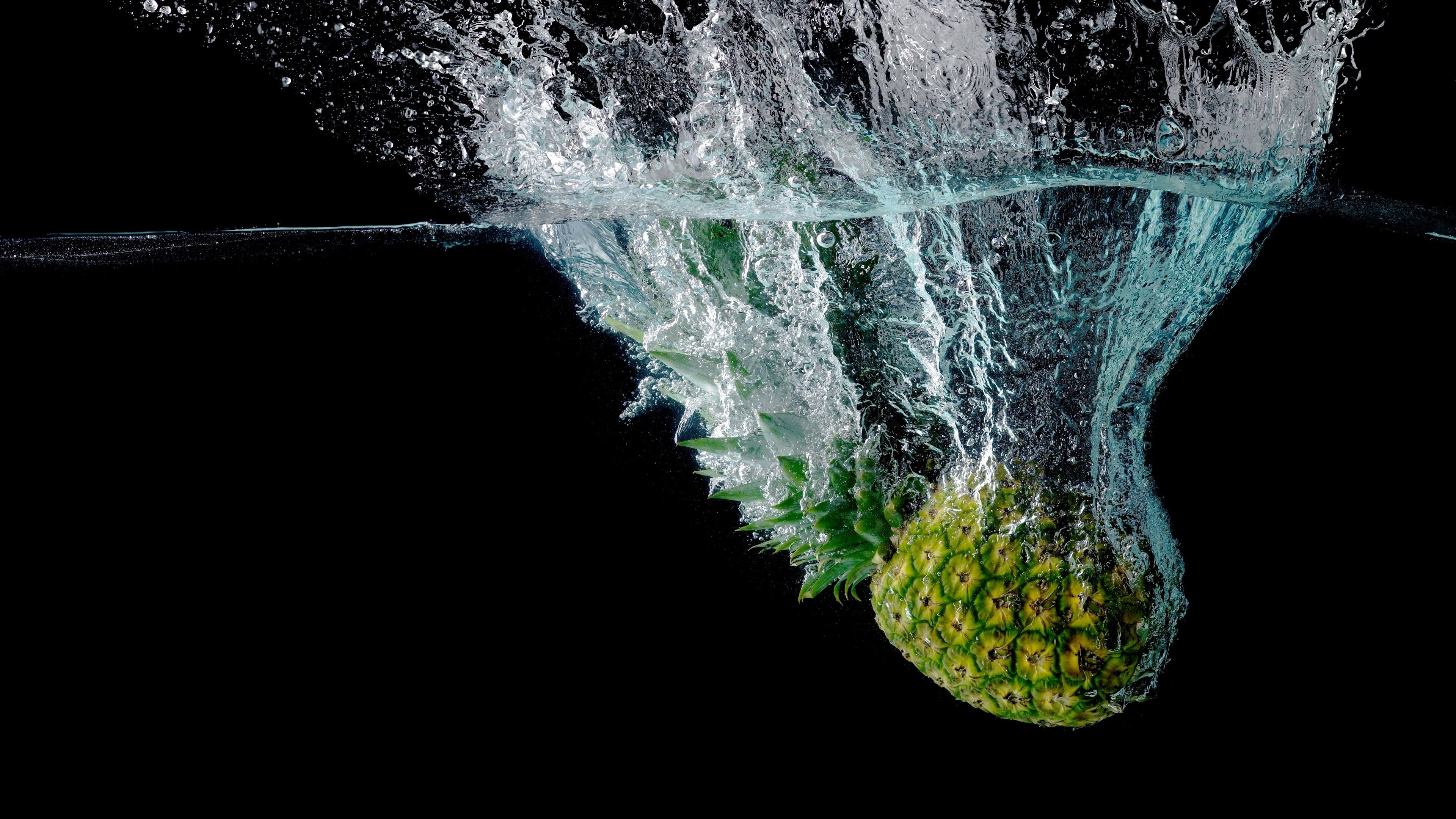 Wallpaper Pineapple fall to the water, splash, bubbles 3840x2160