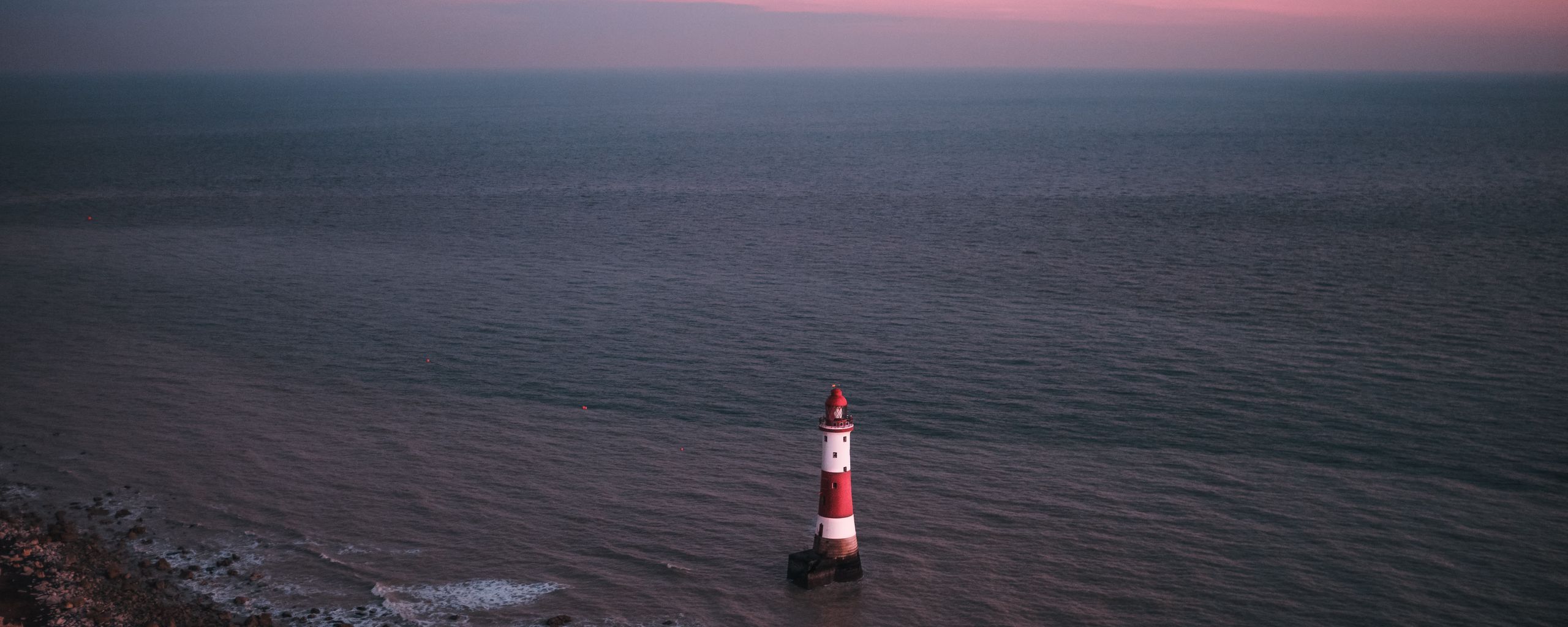 Download wallpaper 2560x1024 lighthouse, sea, aerial view, coast