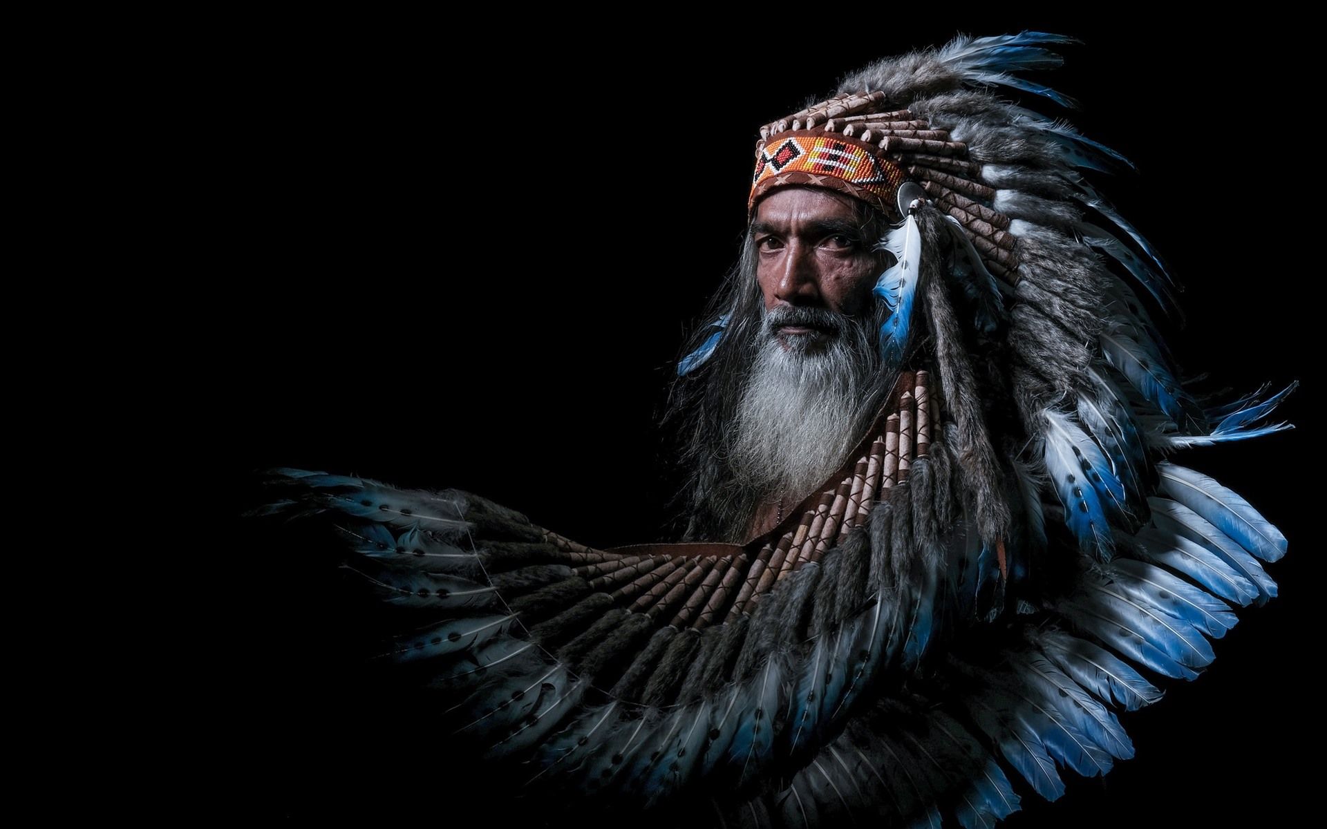 Wallpaper Indian, man, feathers, black background 1920x1200 HD