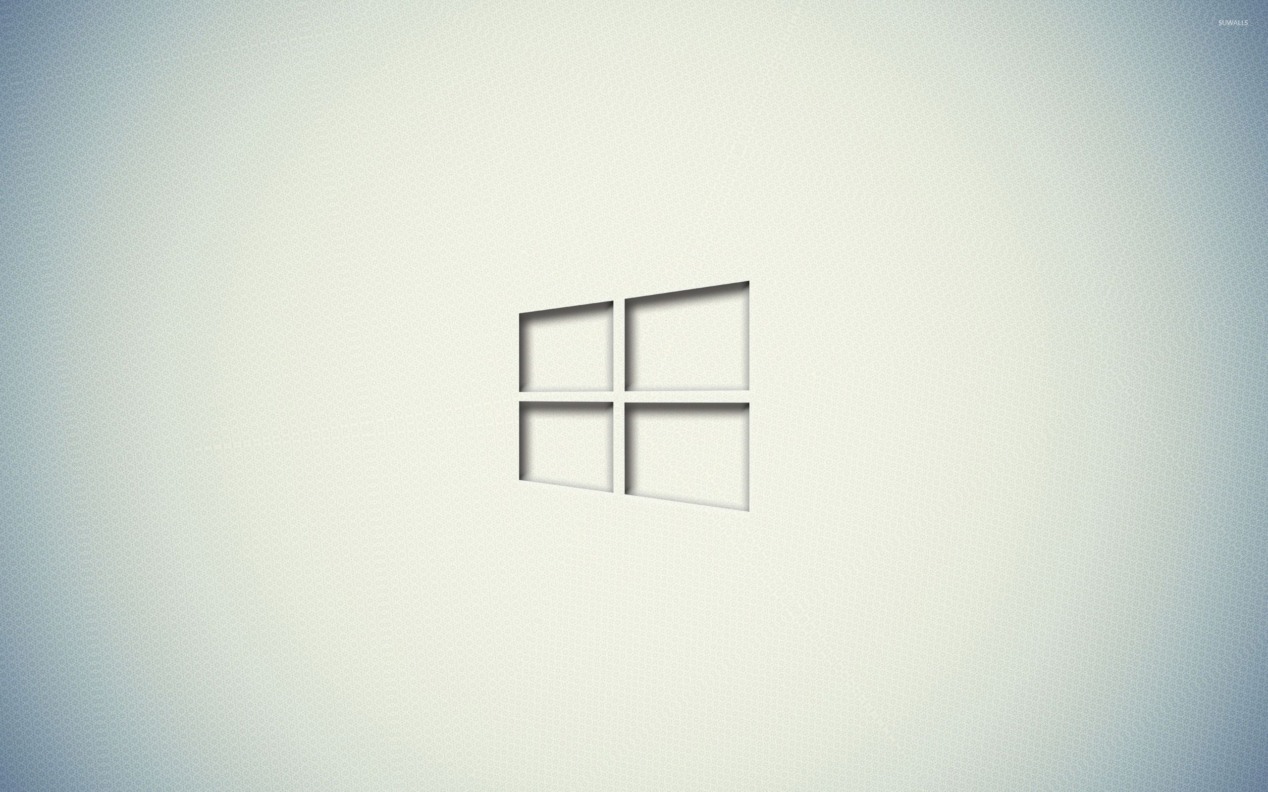 Windows 10 transparent logo on a white wall wallpaper