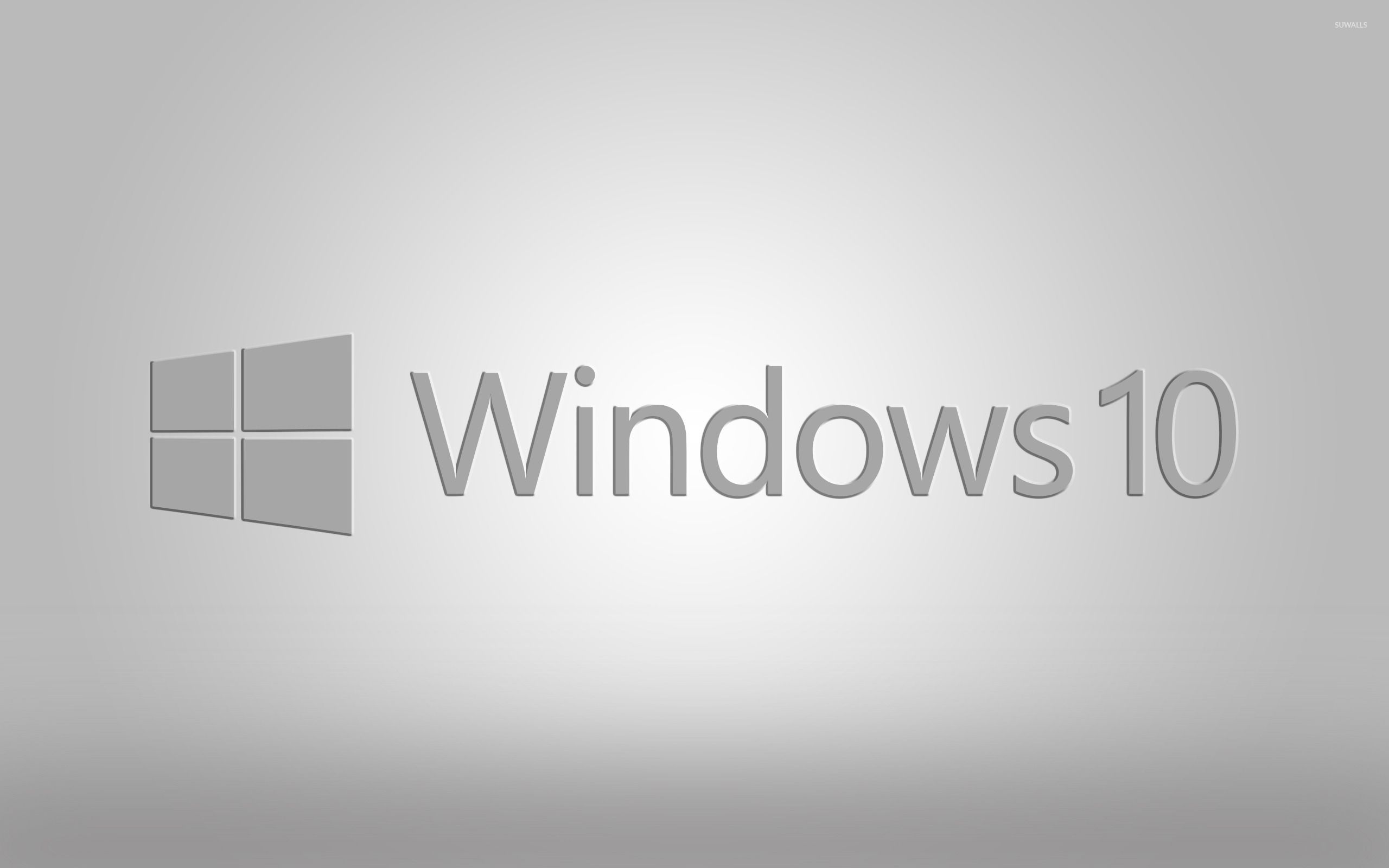 Windows 10 gray text logo on gray gradient wallpaper