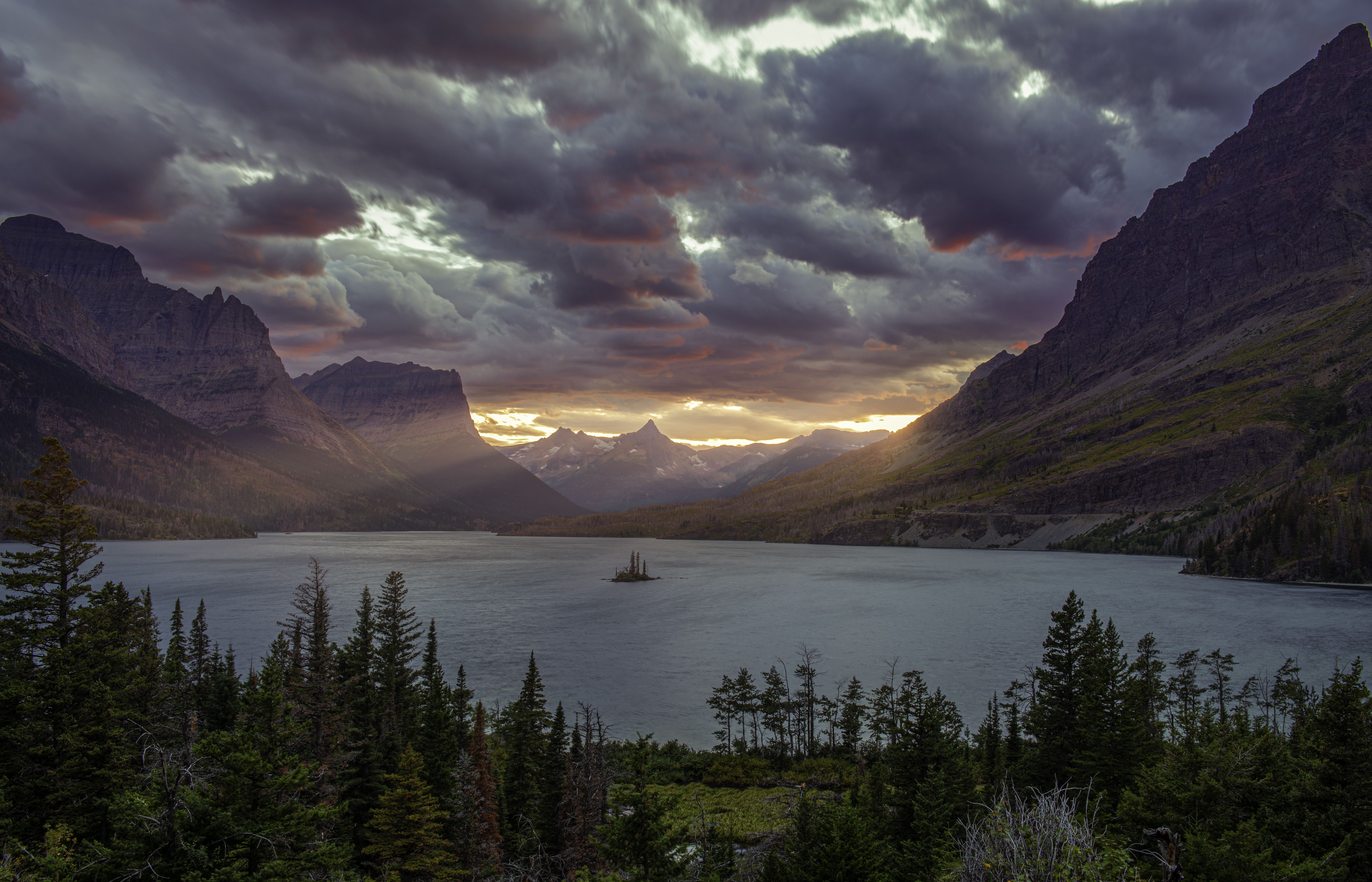 Sun rising over a beautiful mountain lake 5k Retina Ultra HD