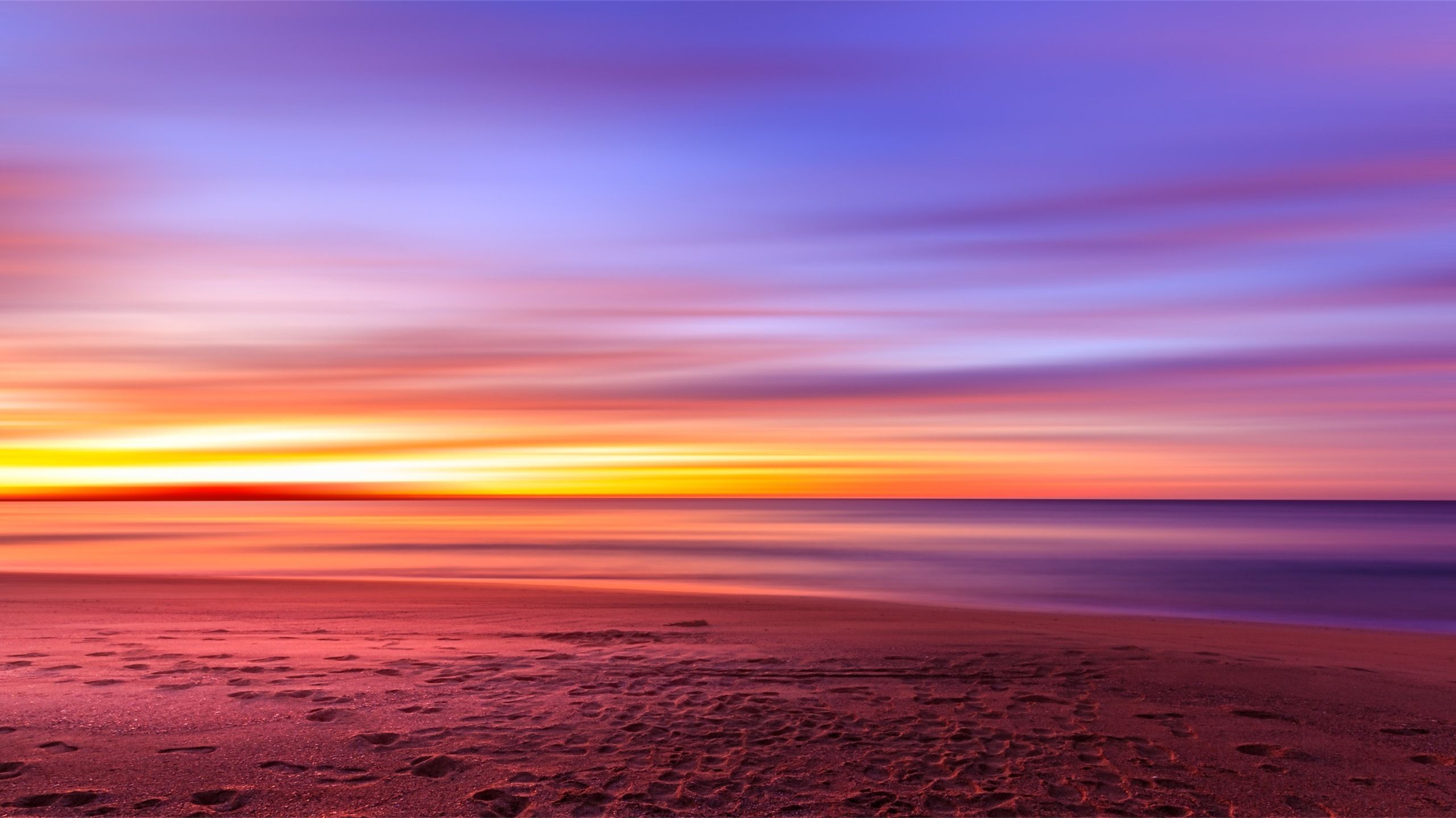 Purple Sky Beach Sunset Sand Footprints 1440P Resolution
