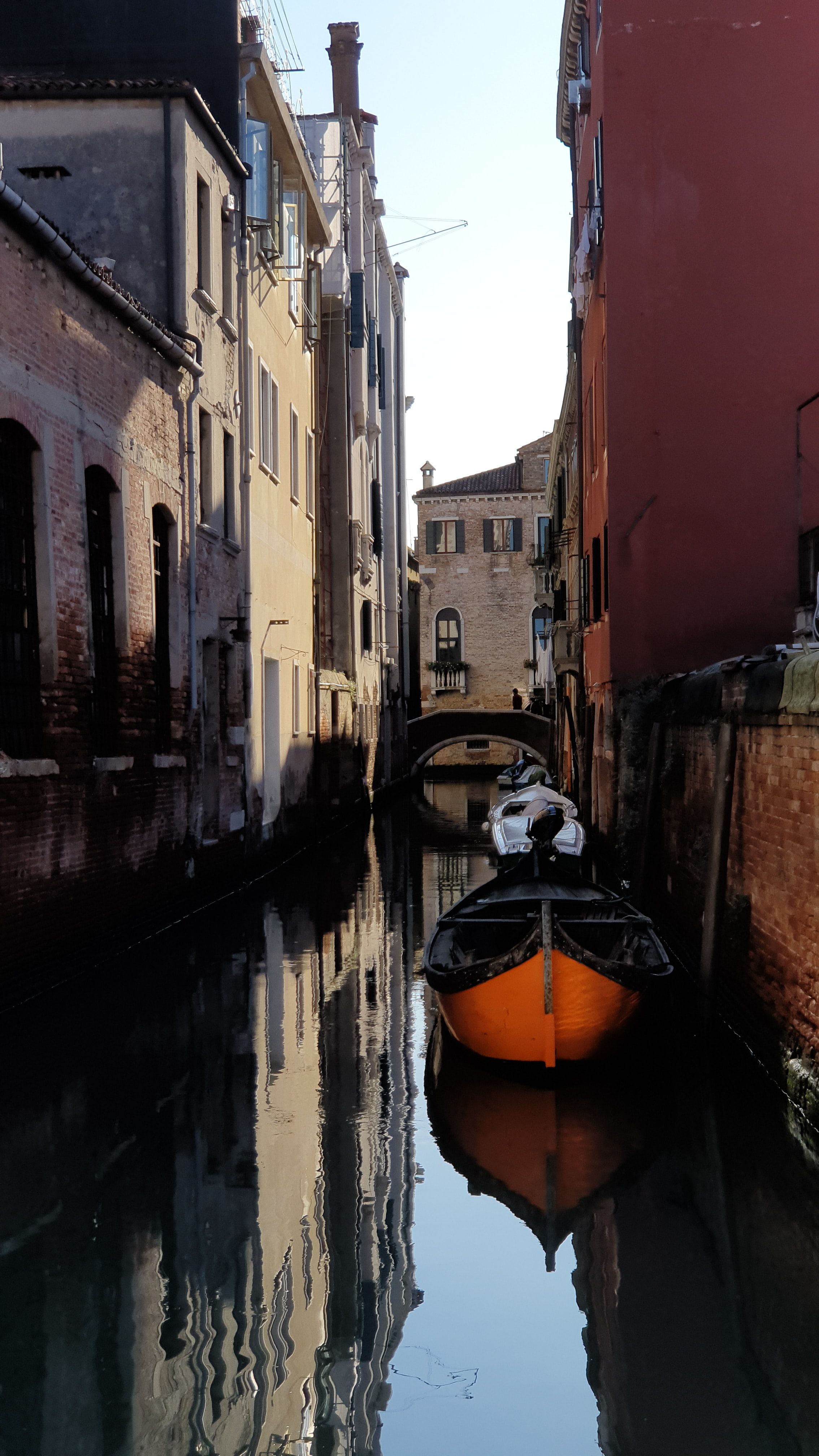 orange and black canoe boat photo
