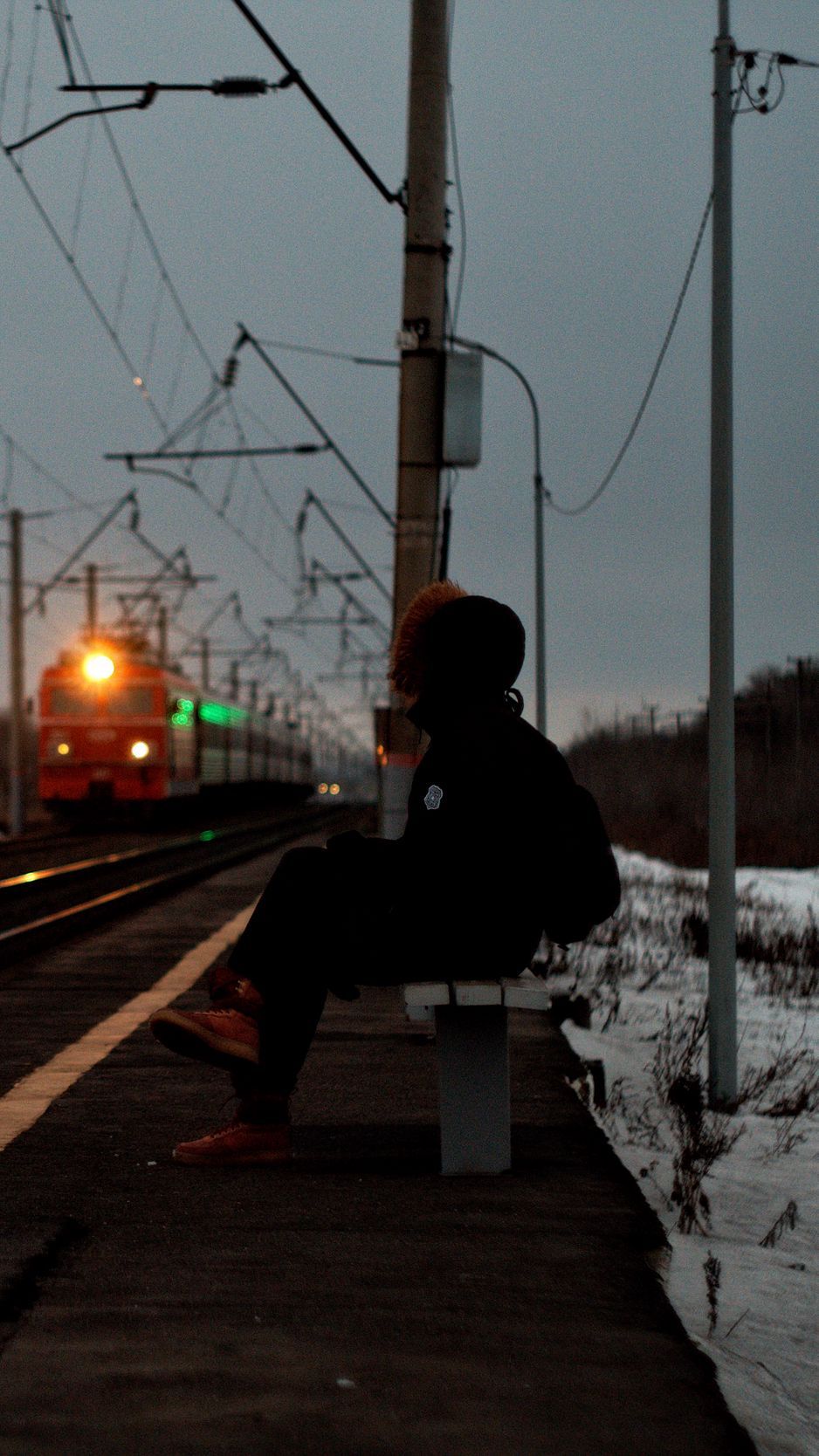Download wallpapers 938x1668 silhouette, alone, sad, train, station