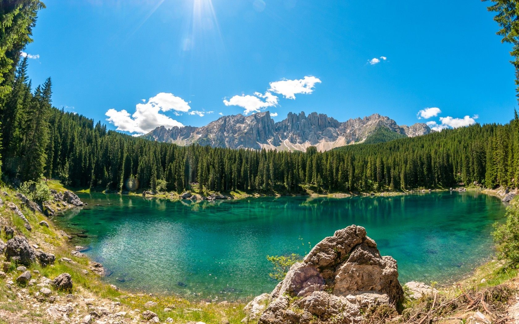 Lake lago di carezza wood stone trees mountasins sky wallpaper