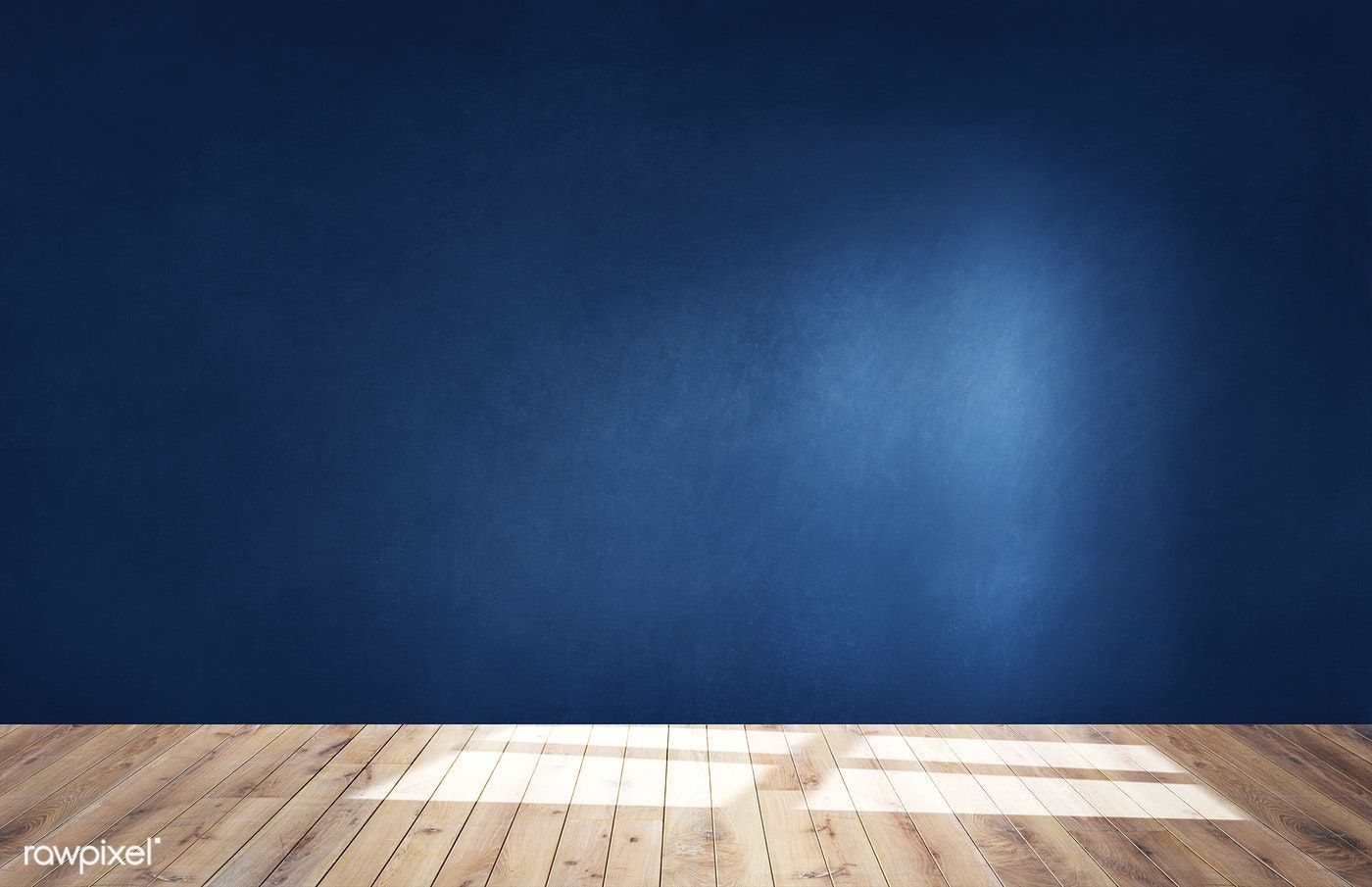 Download premium image of Dark blue wall in an empty room with a