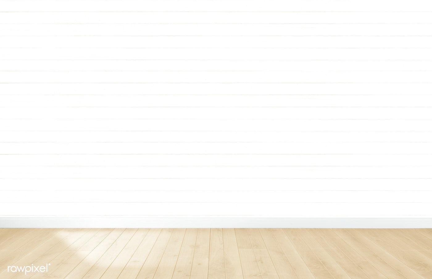 Download premium photo of White wallpaper in an empty room with wooden
