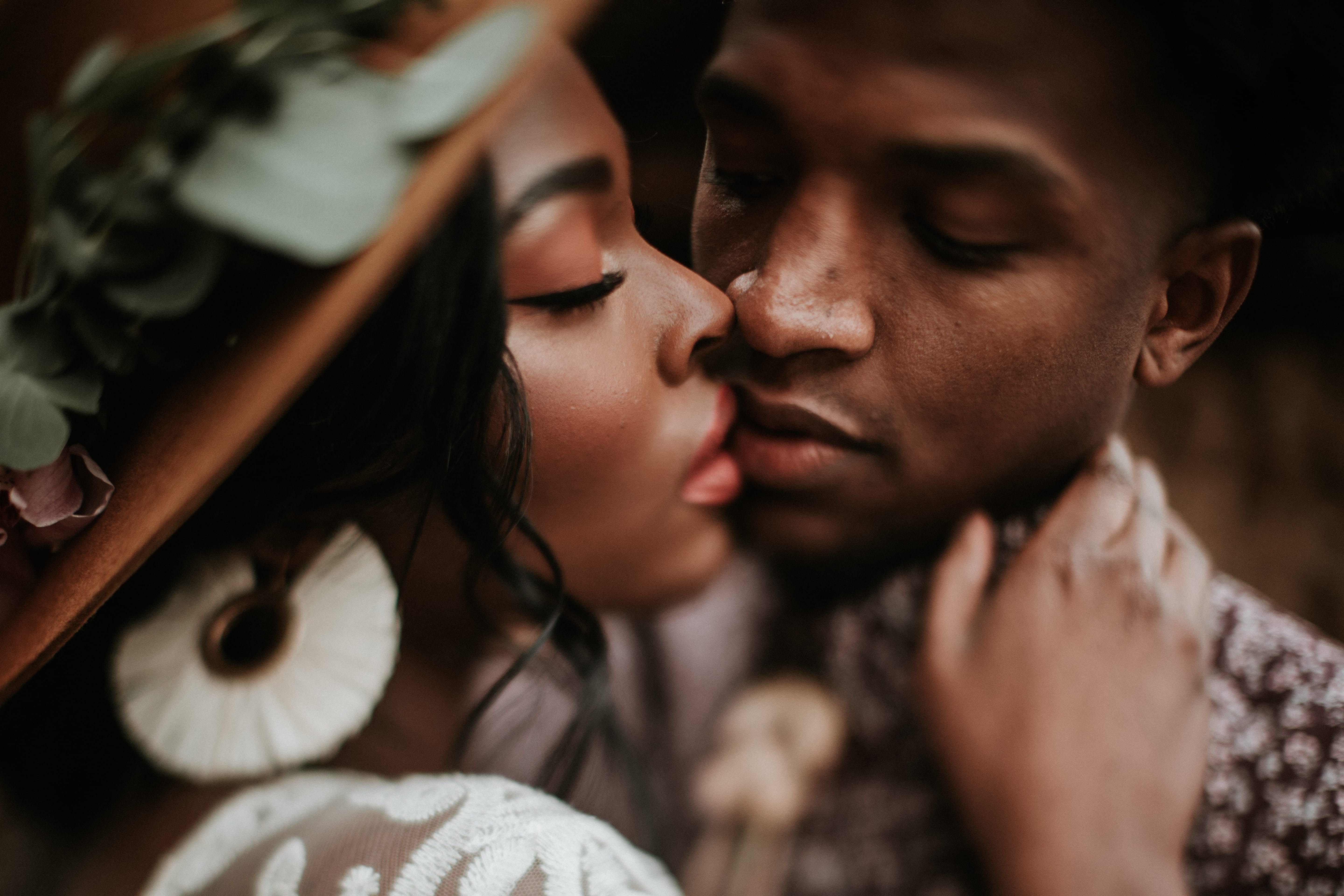 Close Up Photo Of Man Kissing Woman · Free