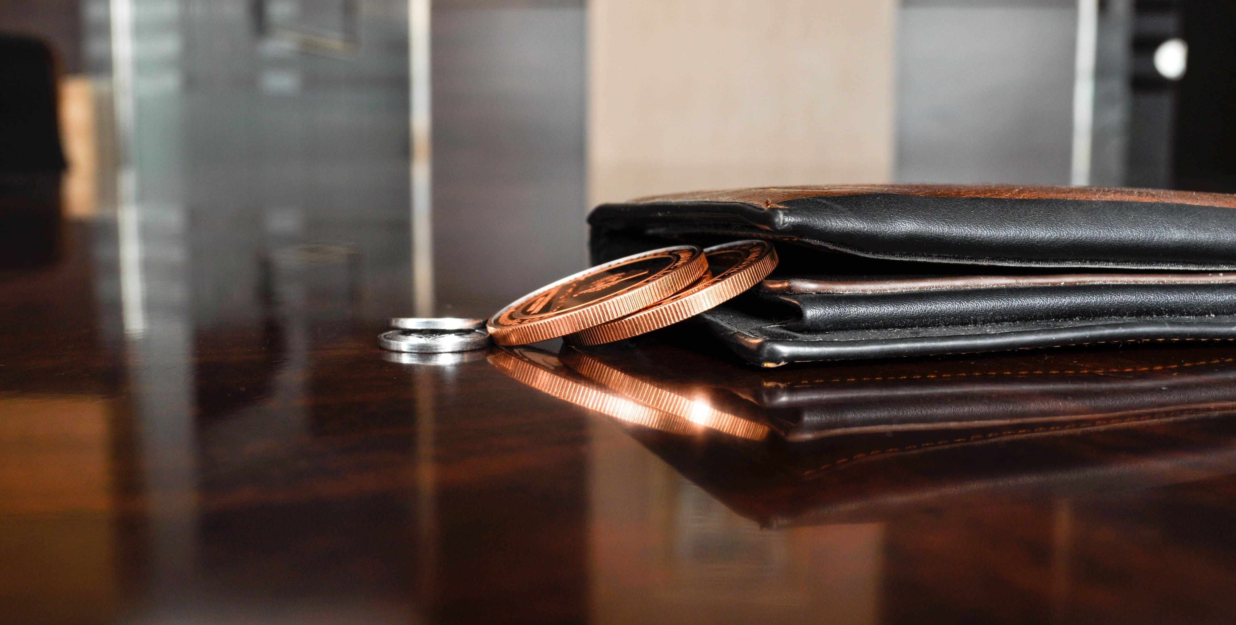black leather wallet on table free image