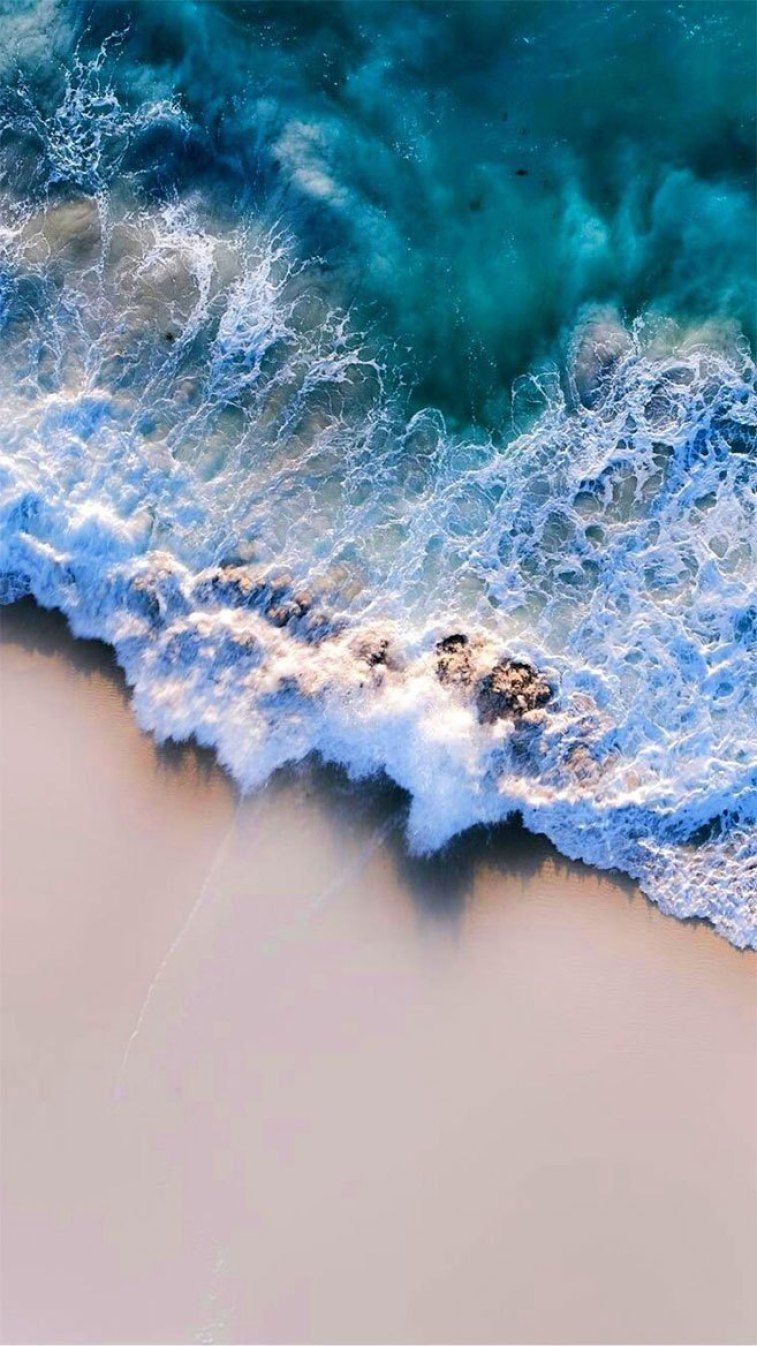 Deep green sea big waves and clean beach iphone wallpaper