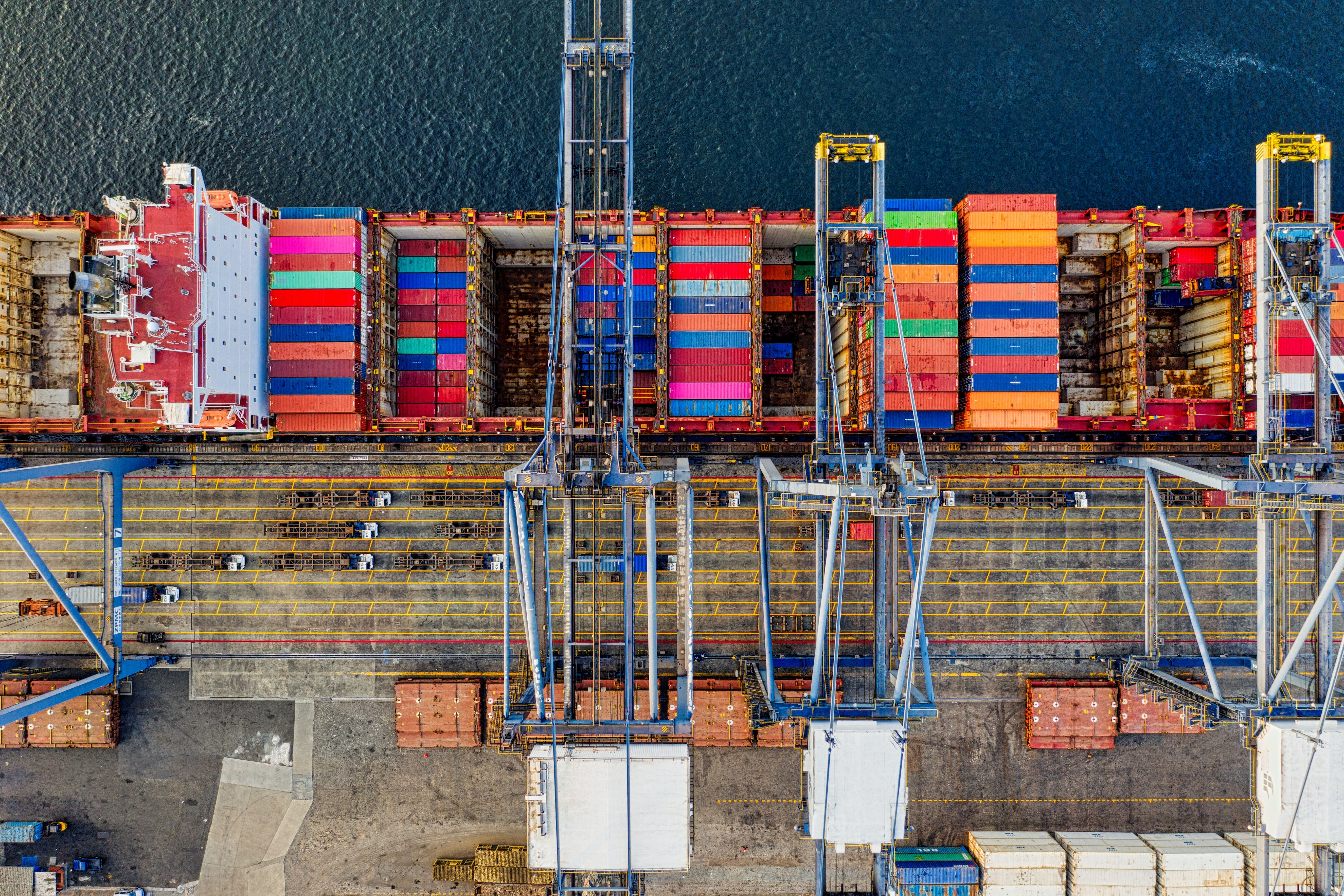 Top View Photography Of Cargo Ship With Intermodal Containers