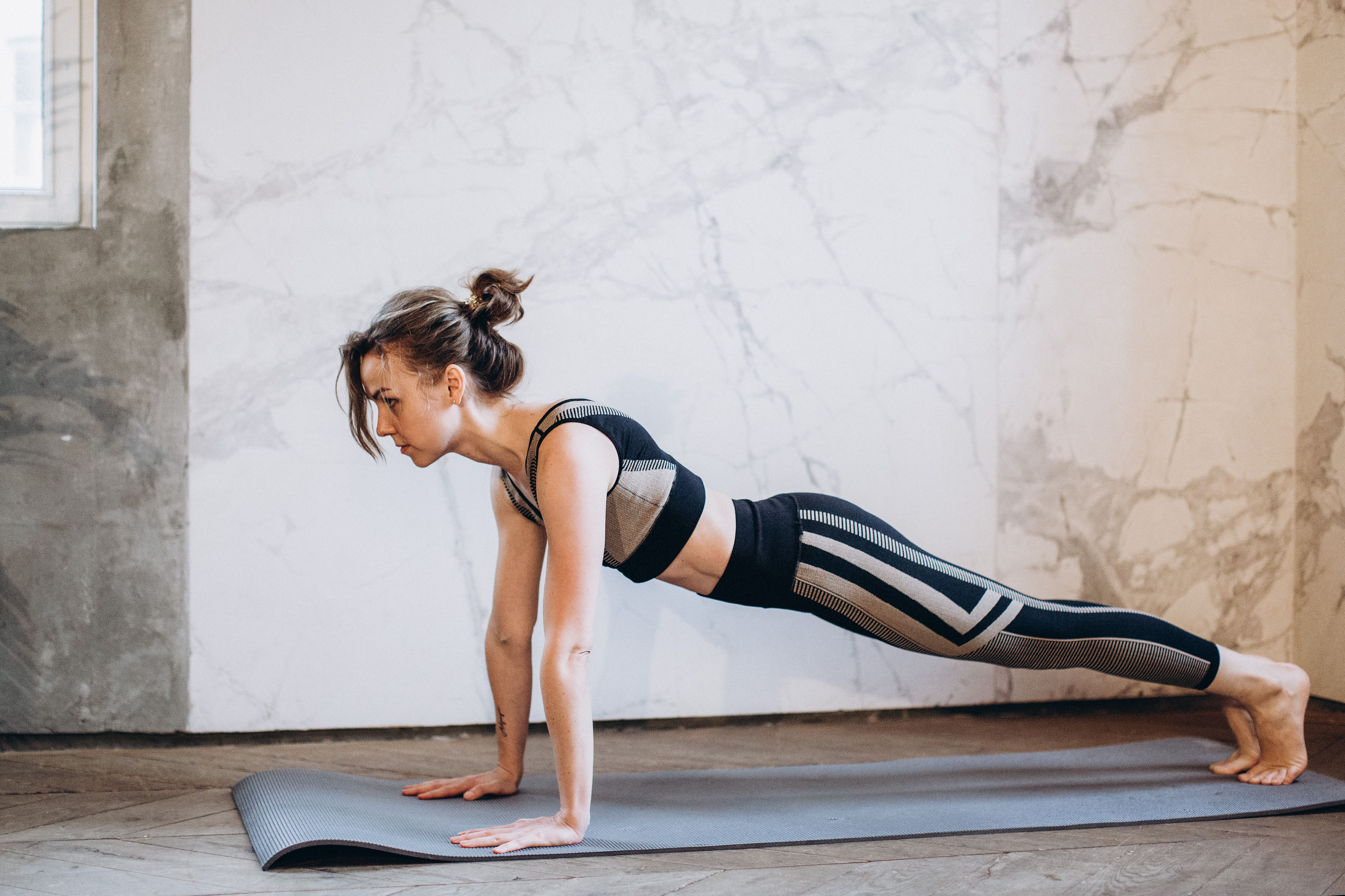 Woman in Black Tank Top and Black Leggings Doing Yoga · Free Stock
