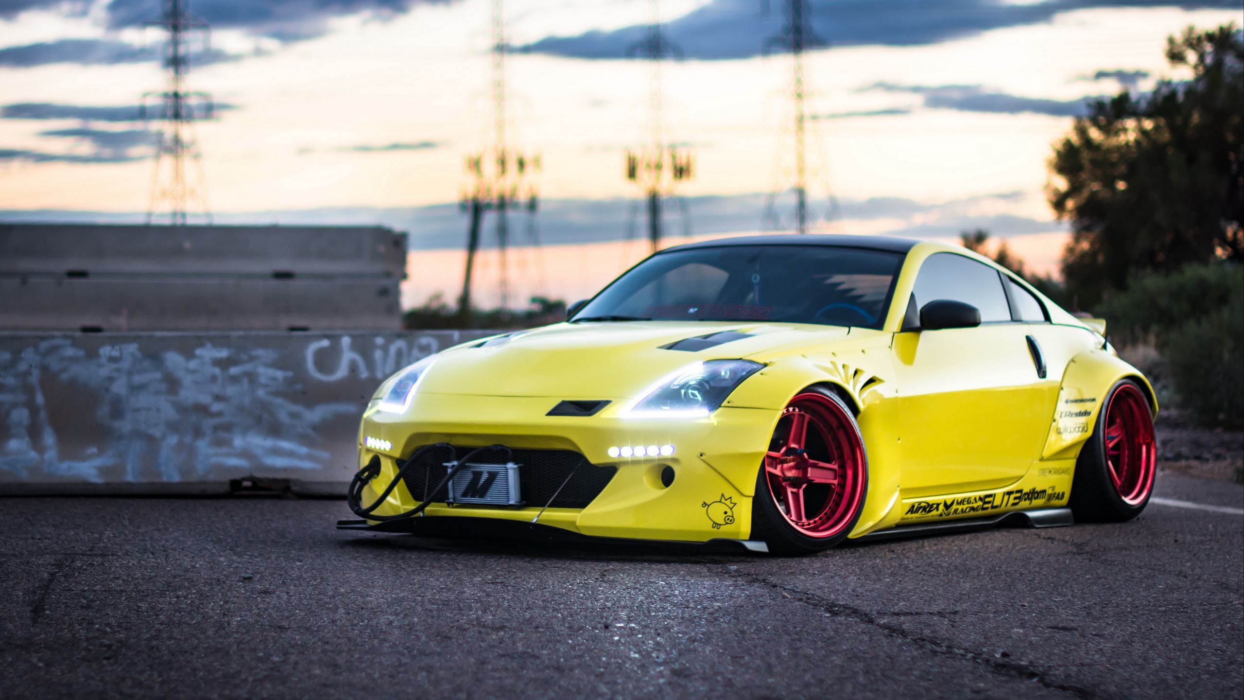 Download wallpaper 2560x1440 nissan 350z, yellow, side view widescreen 16:9 HD background