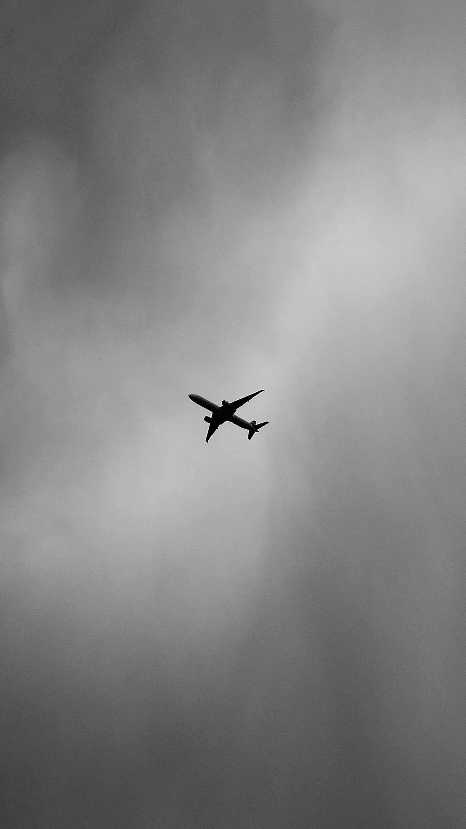 Download wallpaper 938x1668 airplane, bw, minimalism, flight, sky