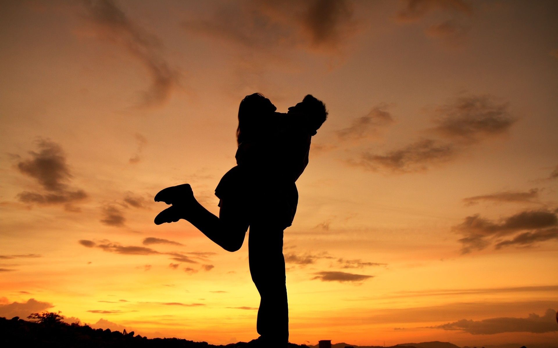 Hugging lovers, man and woman shadows, sunset wallpaper