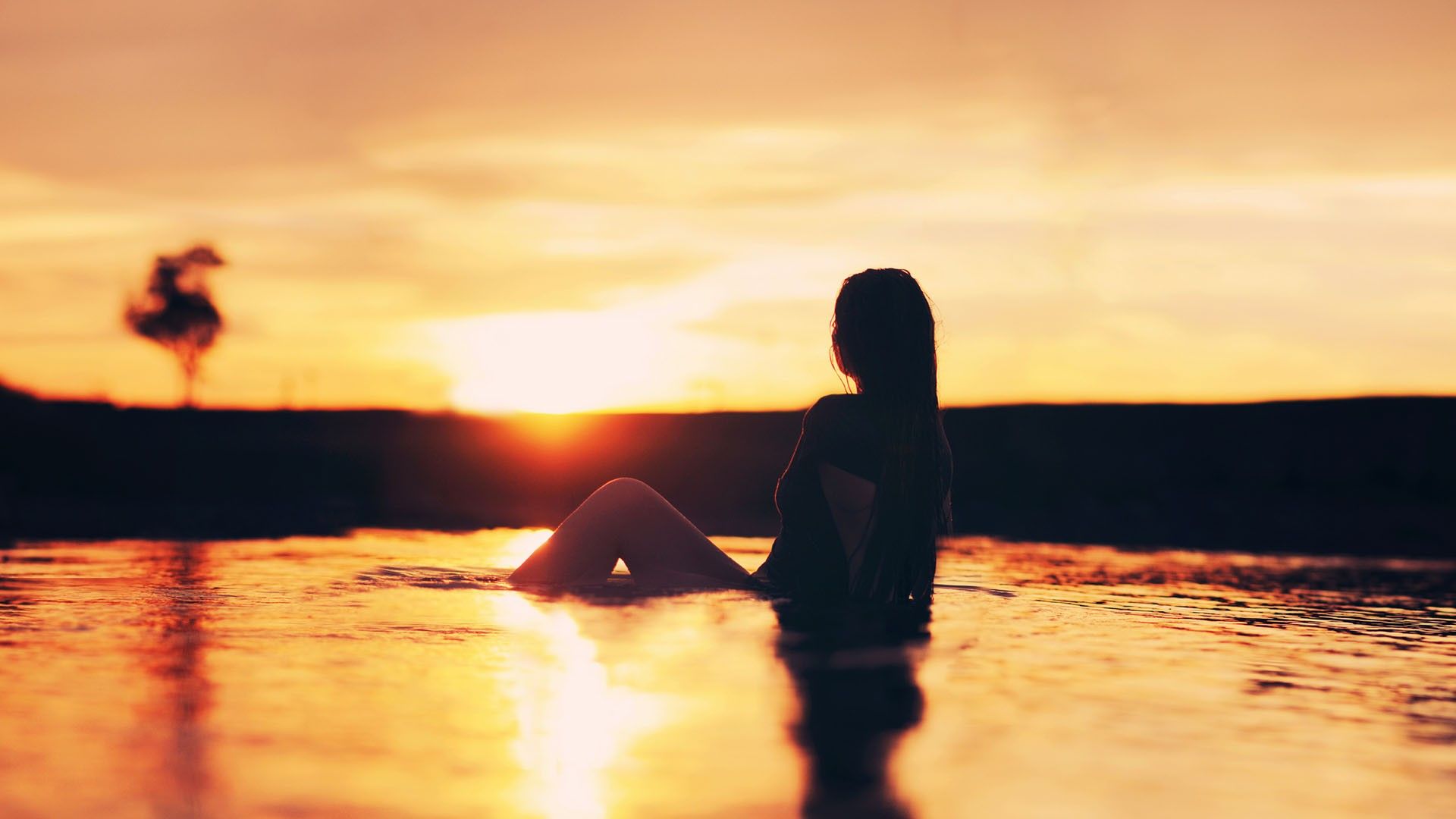 Girl on Australian Beach Sunset Wallpaper