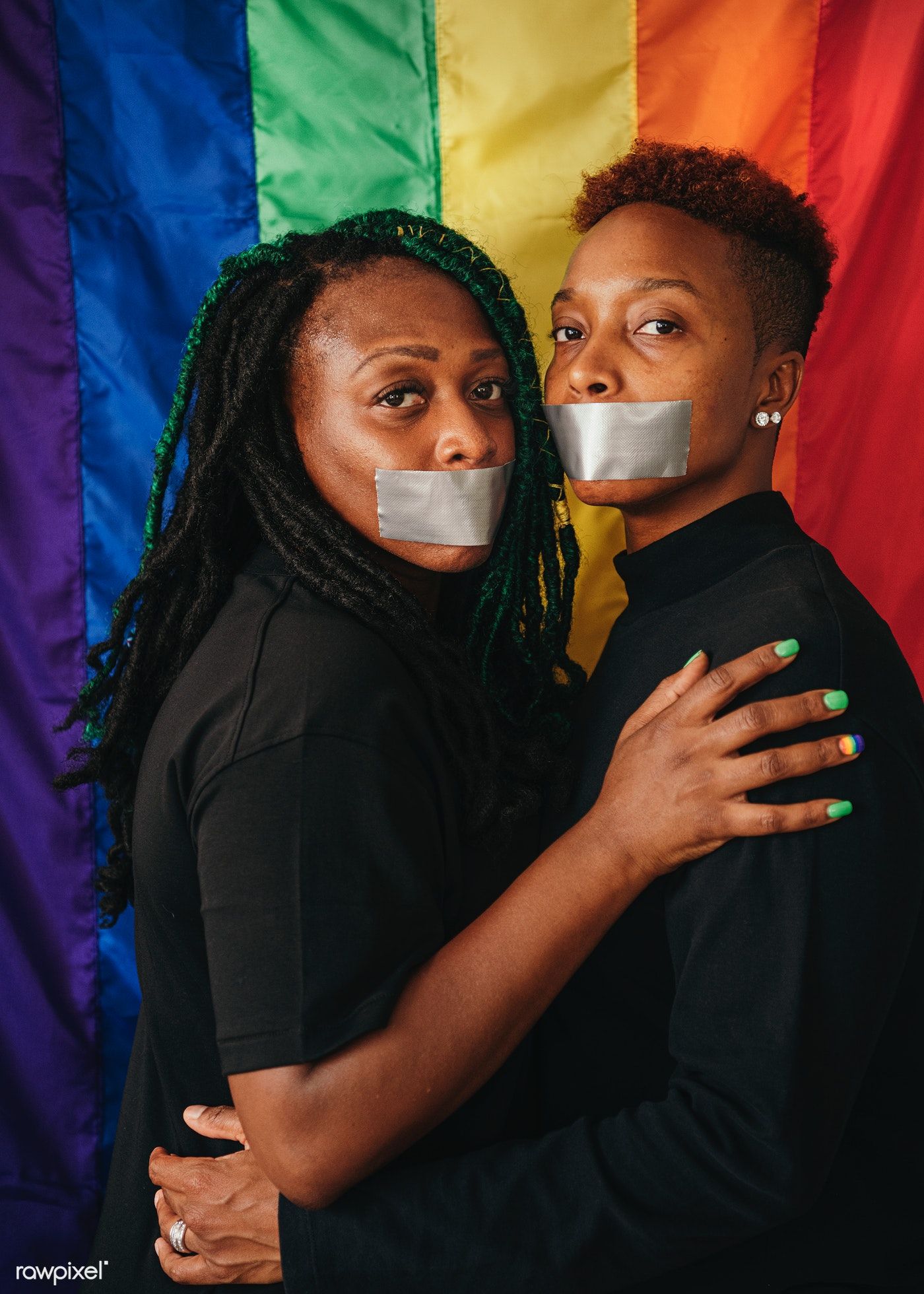 Download premium image of Lesbian couple wearing tapes on their mouth