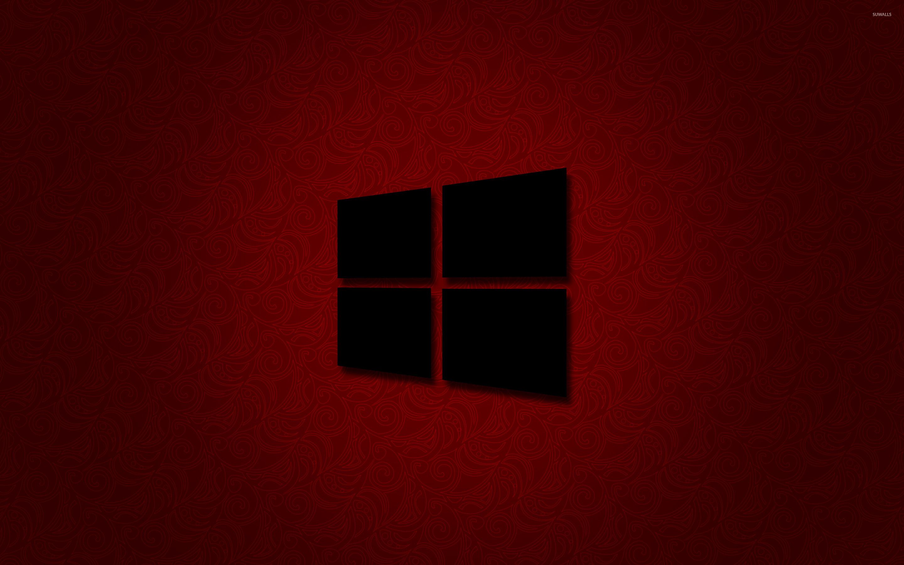 Windows 10 black logo on red wallpaper