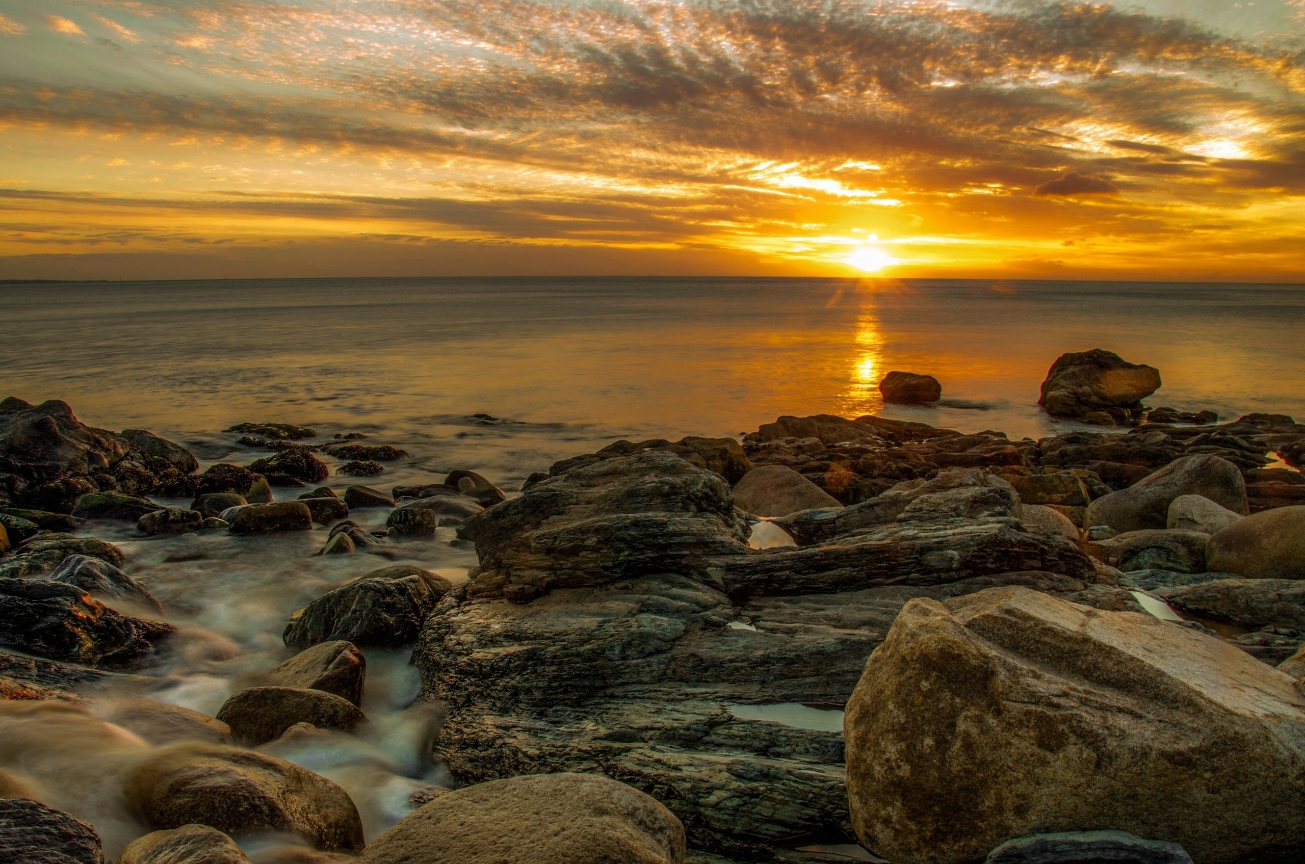 Sea aeYaeY rocks sunset sky clouds beach reflection wallpaper