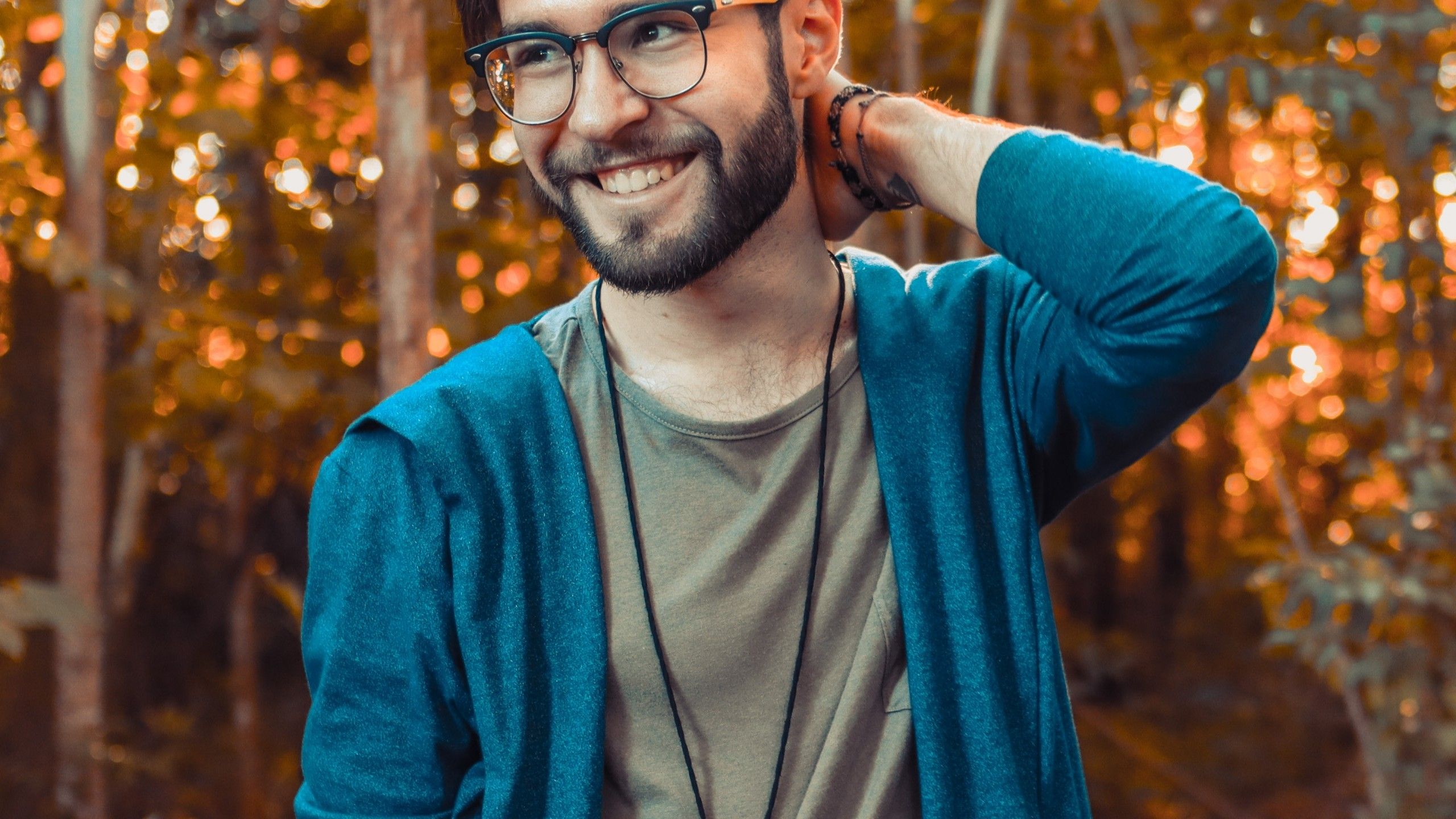 Download 2560x1440 Man, Smiling, Glasses, Necklace, Fashion, Style
