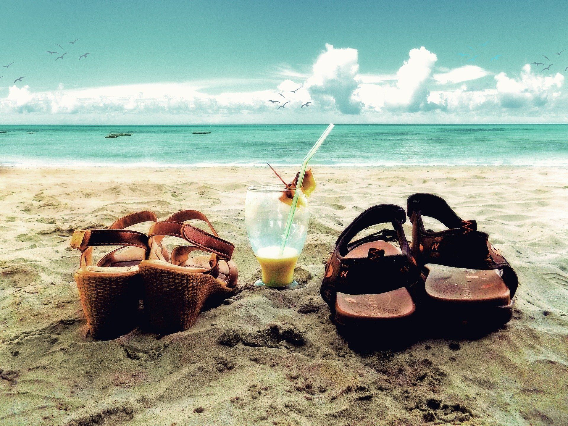 His and hers sandals on a tropical beach HD Wallpaper. Background