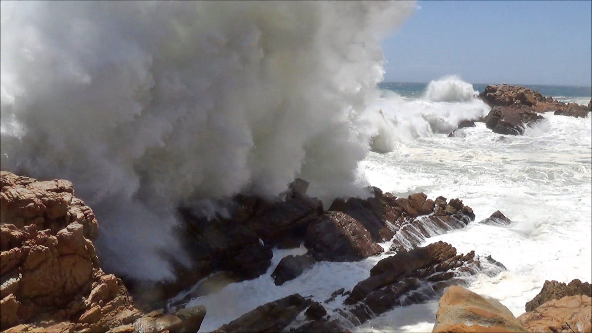 Big ocean waves crashing into rocks and exploding 1080P