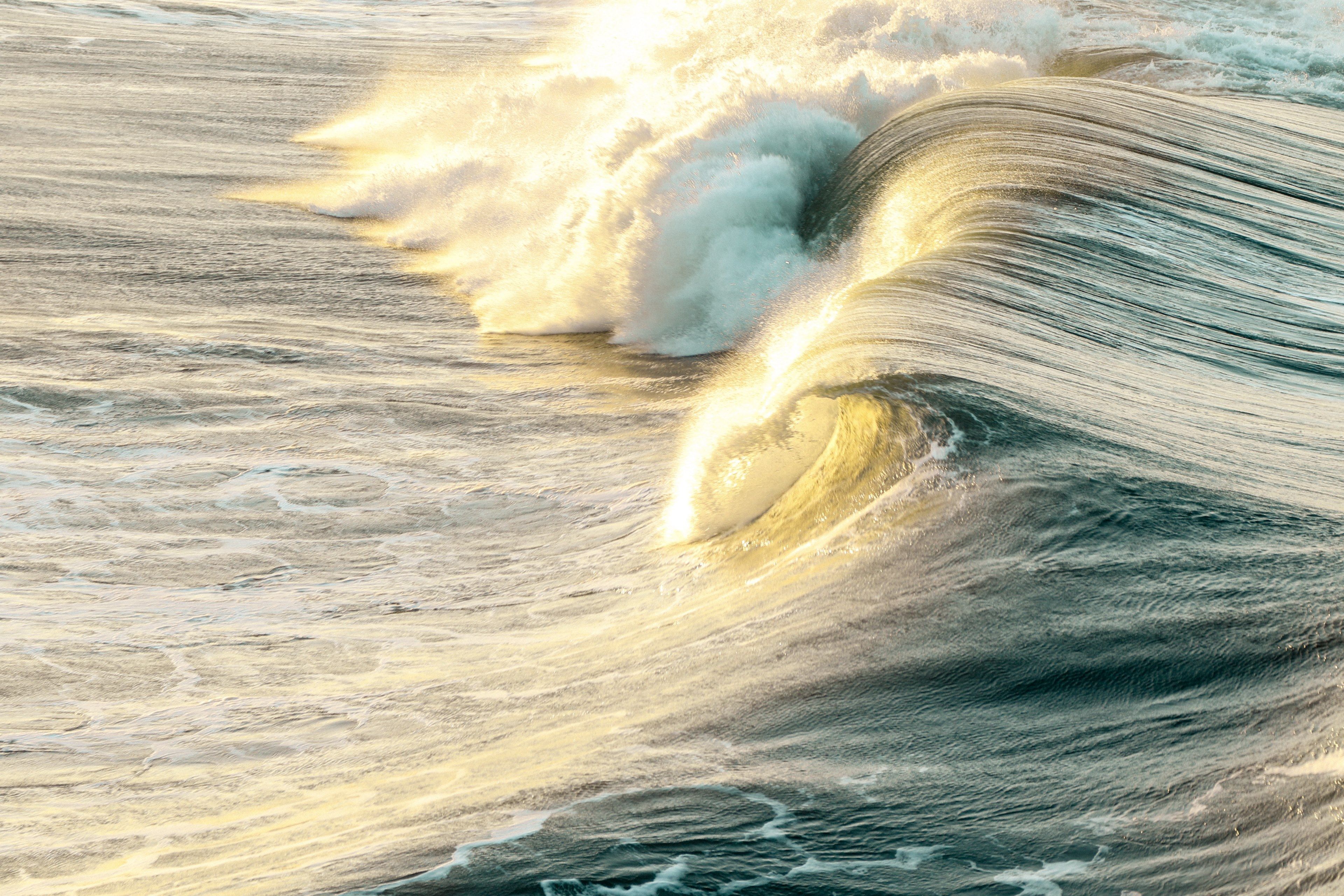 big barrel ocean waves crashing at huntington beachsun sea