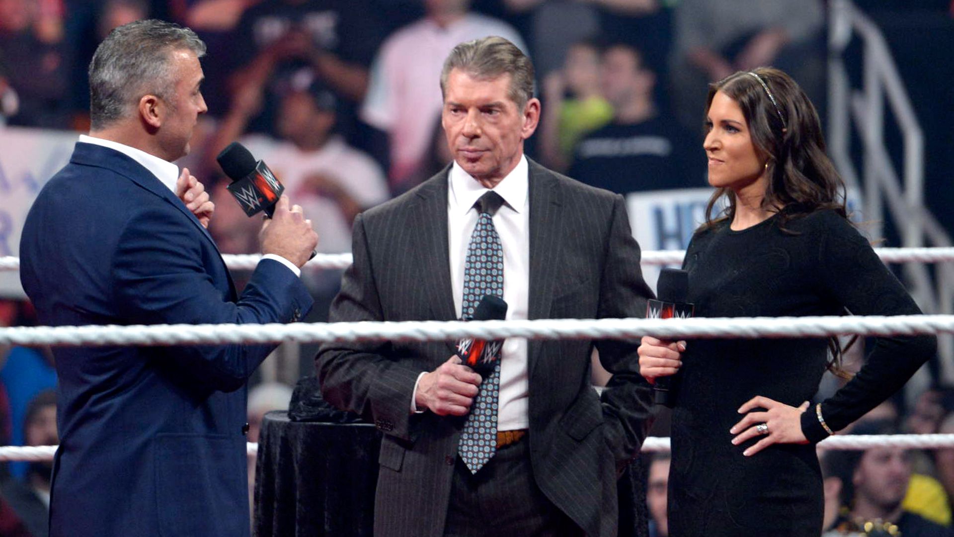 Vince Mcmahon With Stephanie And Shane Wallpaper