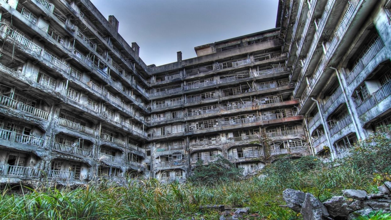 Houses Ruins Balcony Hashima Island in Japan building abandoned