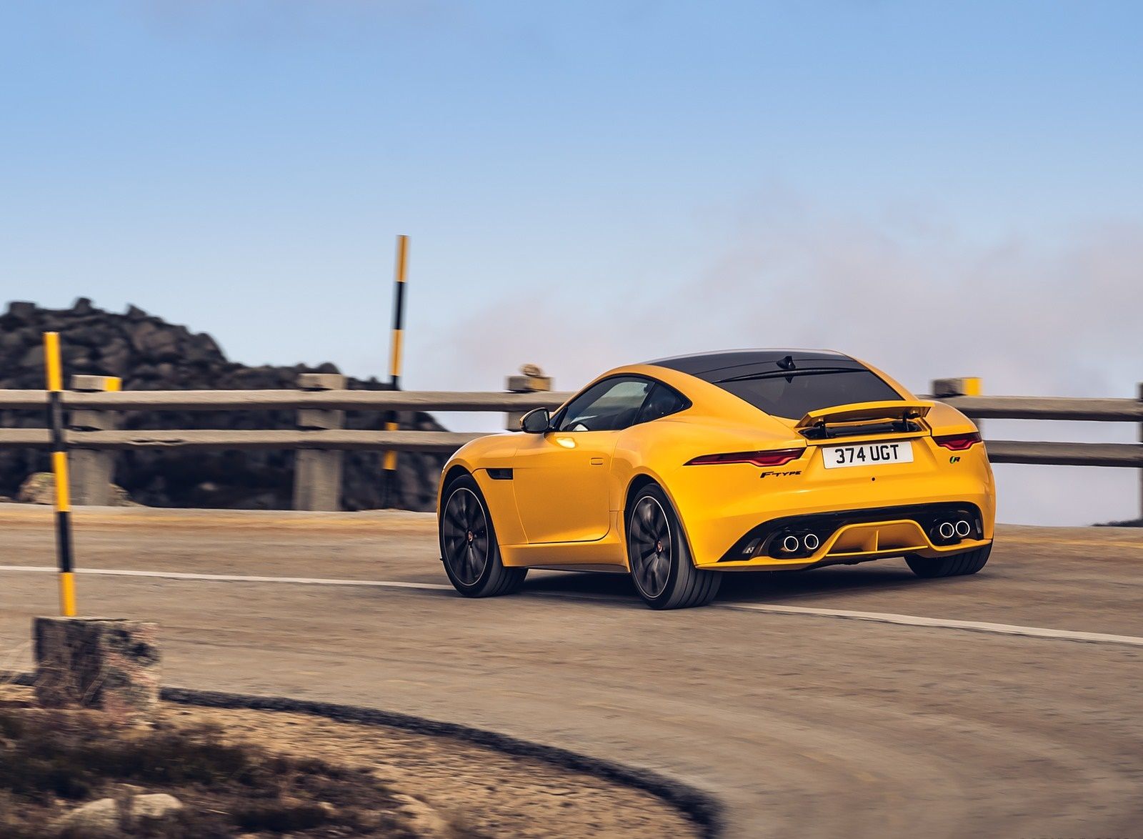 Jaguar F TYPE R Coupe AWD (Color: Sorrento Yellow) Rear Three