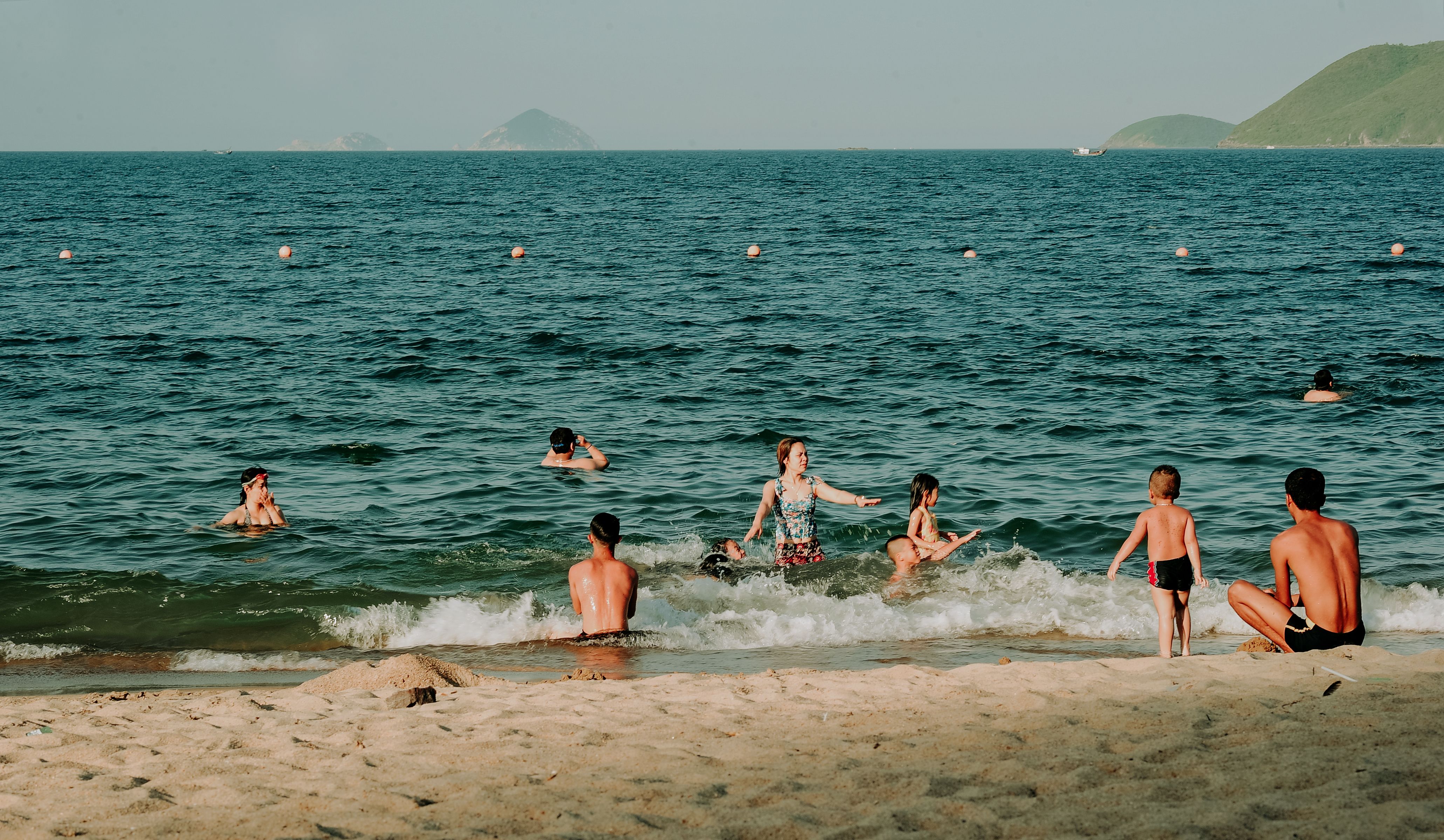 Photography of People Swimming in the Beach · Free