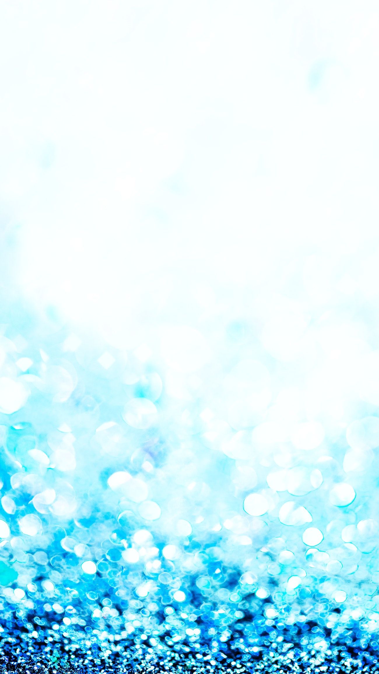 Shiny blue glitter textured mobile wallpaper. Royalty free photo