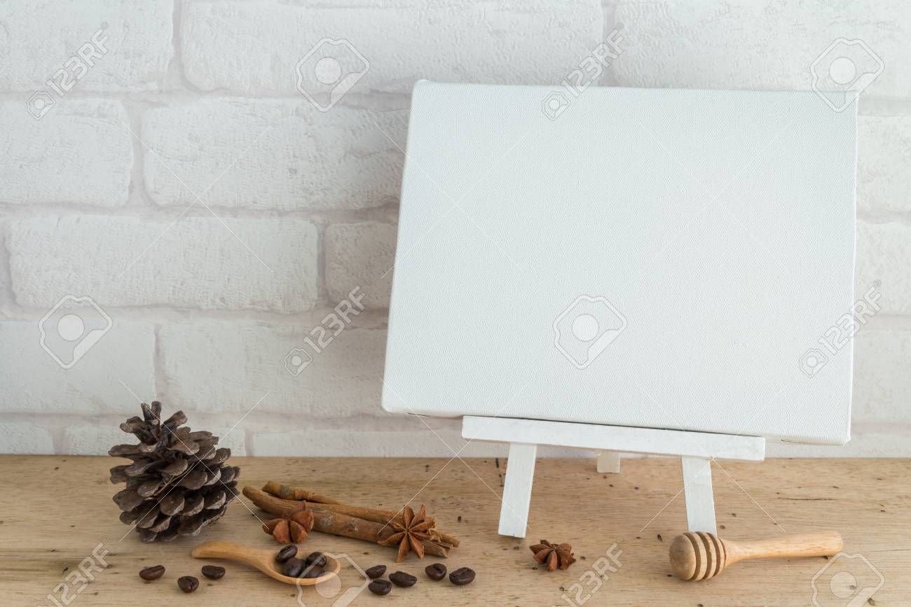 Free download Blank White Wooden Easel Blank Canvas And Coffee Set