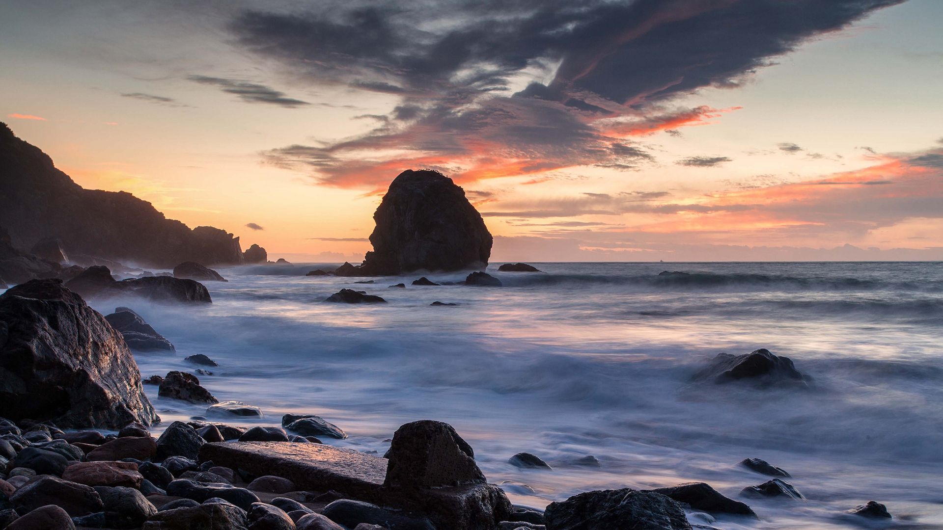 Beach Ocean Rocks Stones sea shore sky clouds waves wallpaper