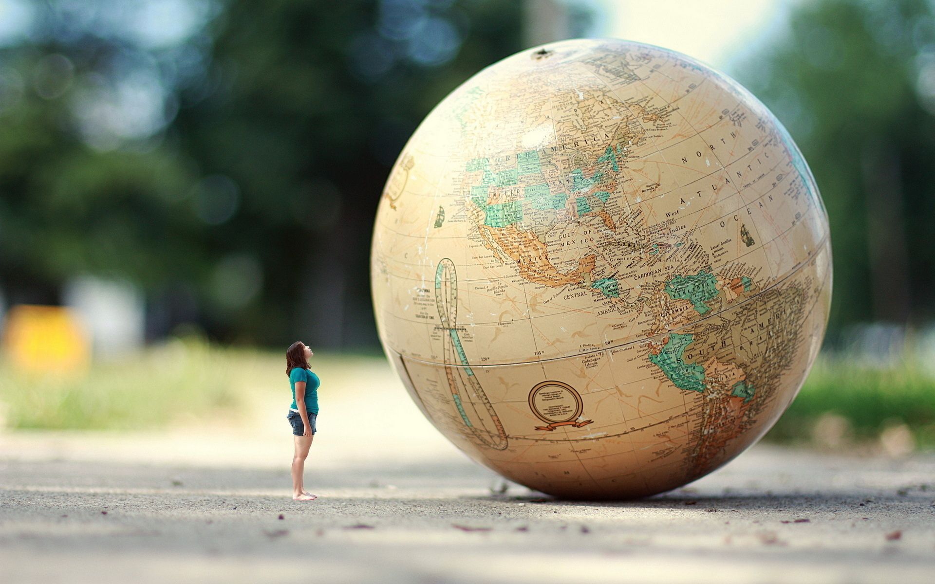 Manip earth globe sphere map women humor mood travel situation