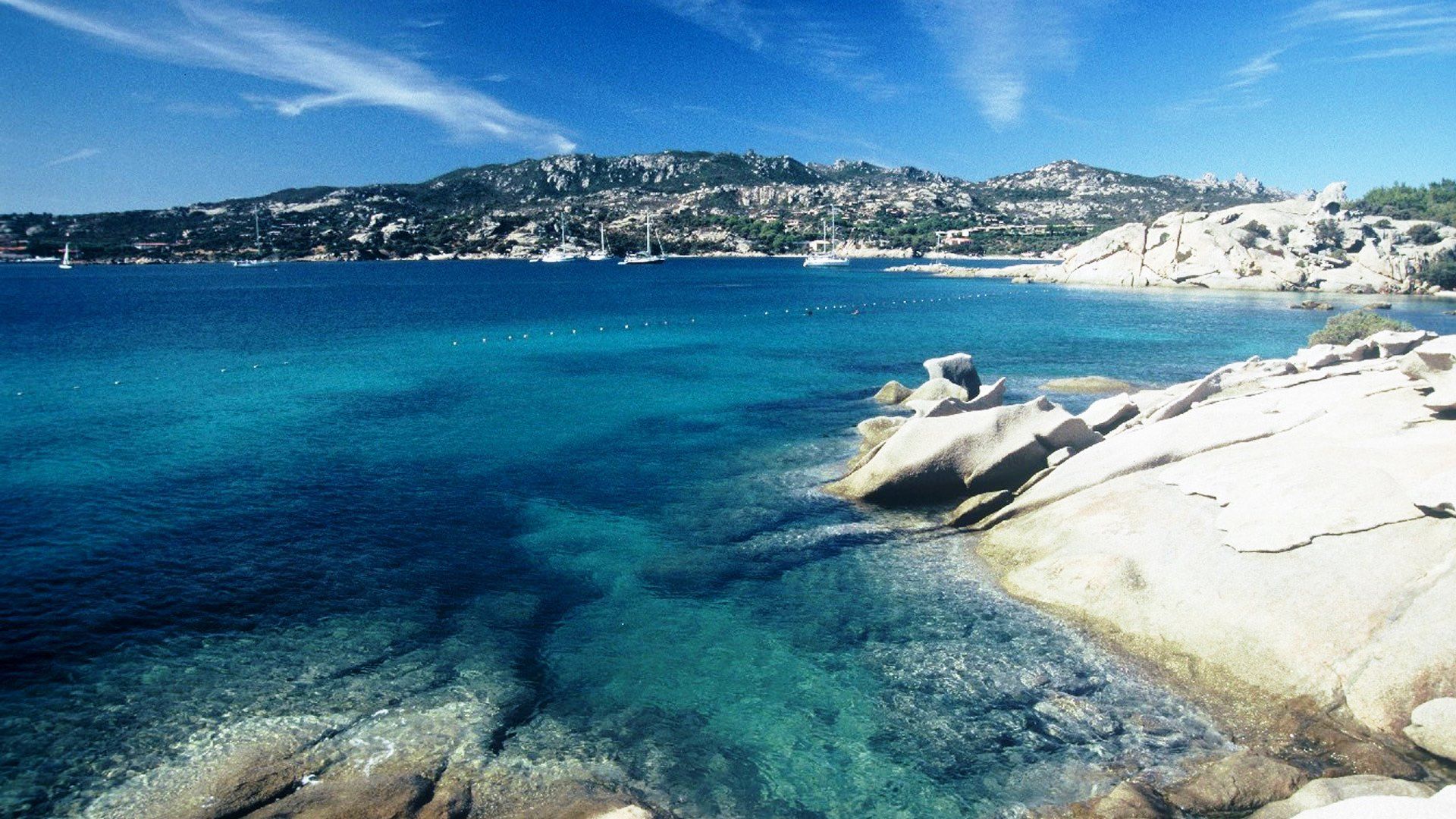 Yachts at coast of the island of Sardinia, Italy wallpaper